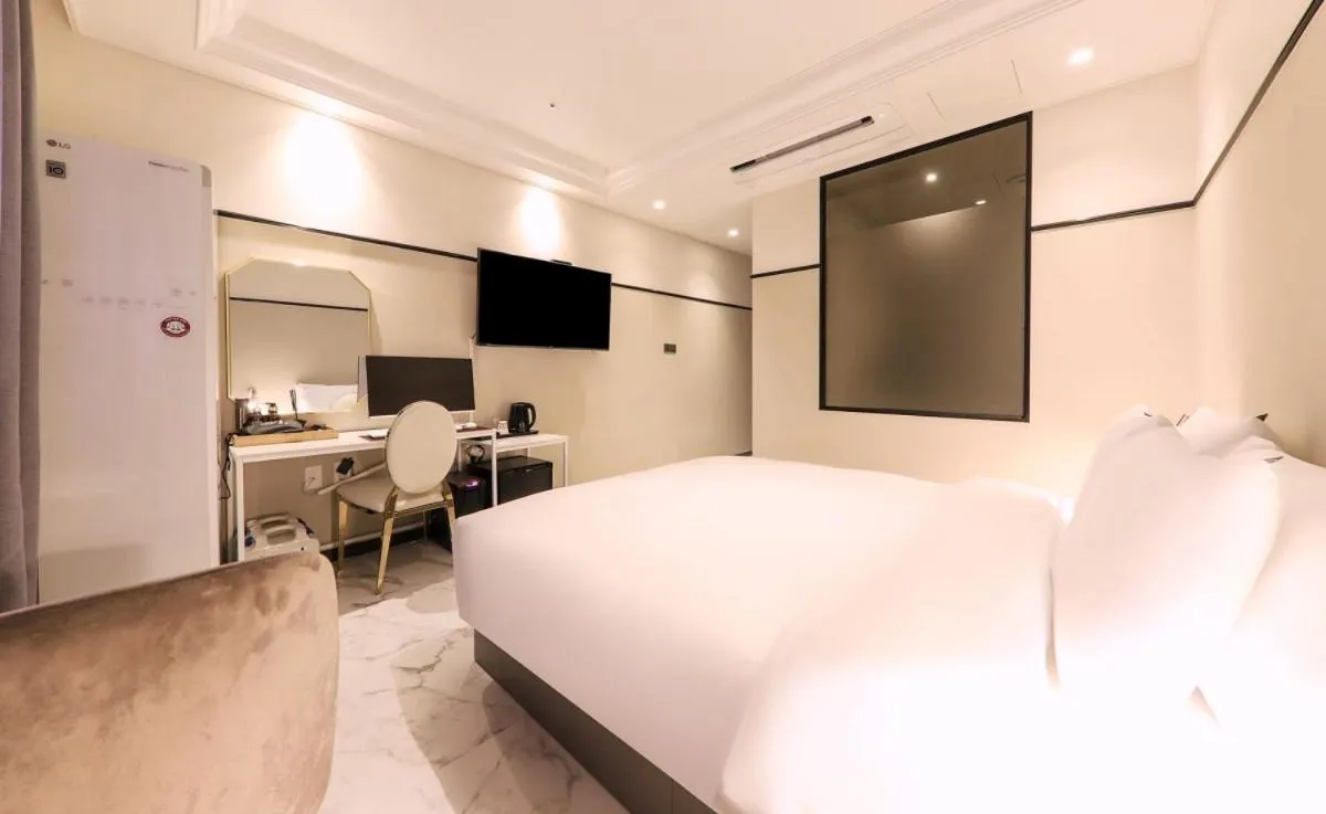 Bed in Brown Dot Hotel Yangsan Seochang