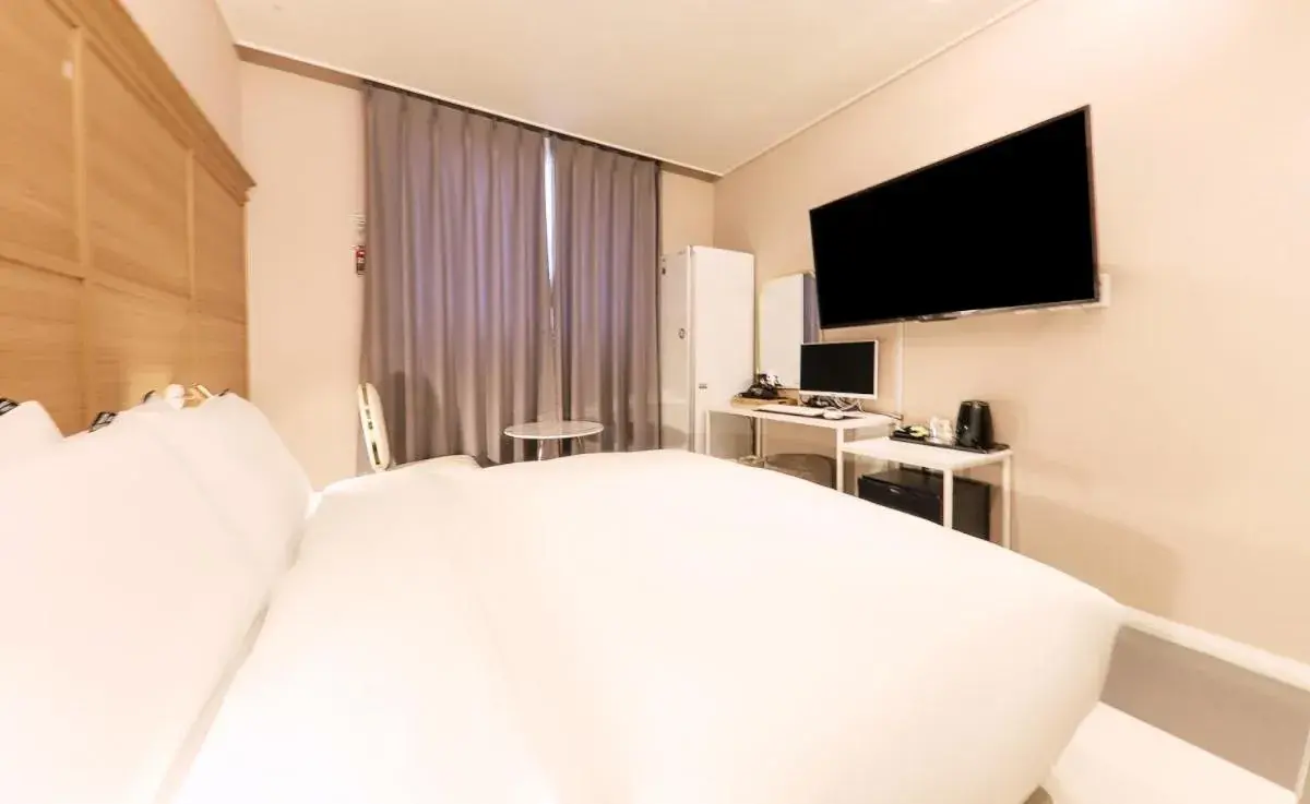 Bed in Brown Dot Hotel Yangsan Seochang Bed in Brown Dot Hotel Yangsan Seochang