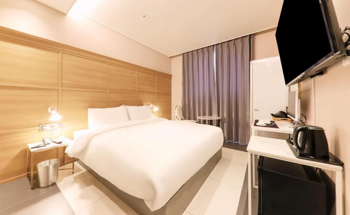 Bed in Brown Dot Hotel Yangsan Seochang