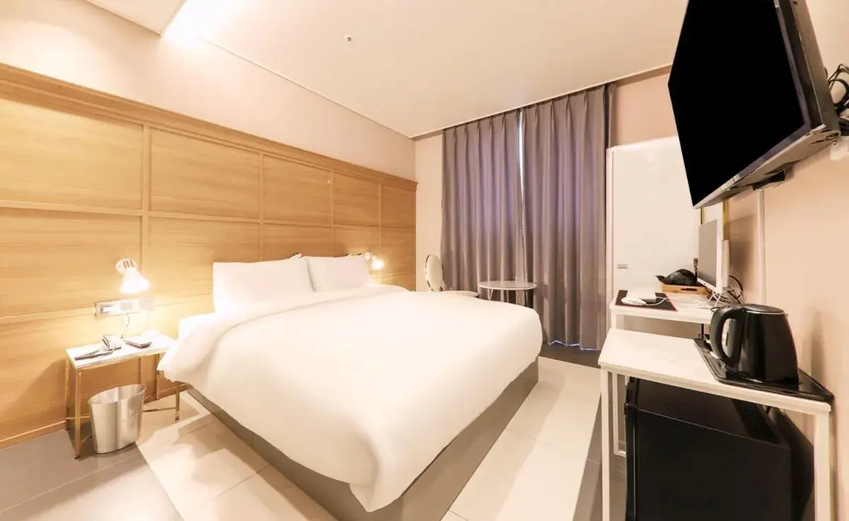 Bed in Brown Dot Hotel Yangsan Seochang Bed in Brown Dot Hotel Yangsan Seochang