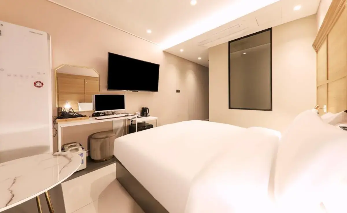 Bed in Brown Dot Hotel Yangsan Seochang Bed in Brown Dot Hotel Yangsan Seochang