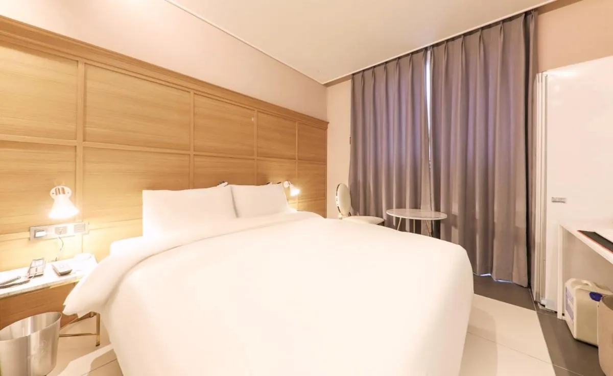 Bed in Brown Dot Hotel Yangsan Seochang