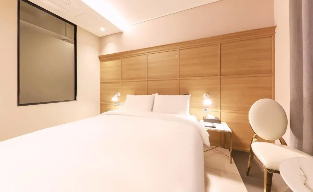 Bed in Brown Dot Hotel Yangsan Seochang Bed in Brown Dot Hotel Yangsan Seochang