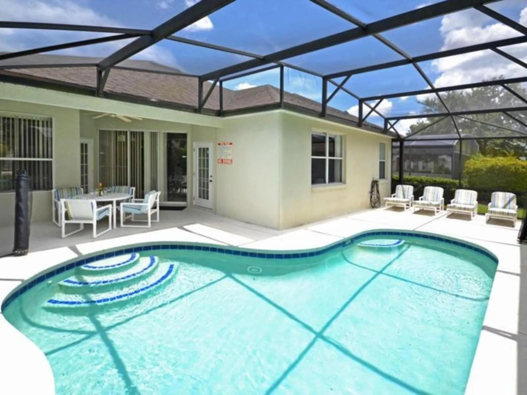 Swimming pool in 4 Bedroom Value Plus Home with Private Pool