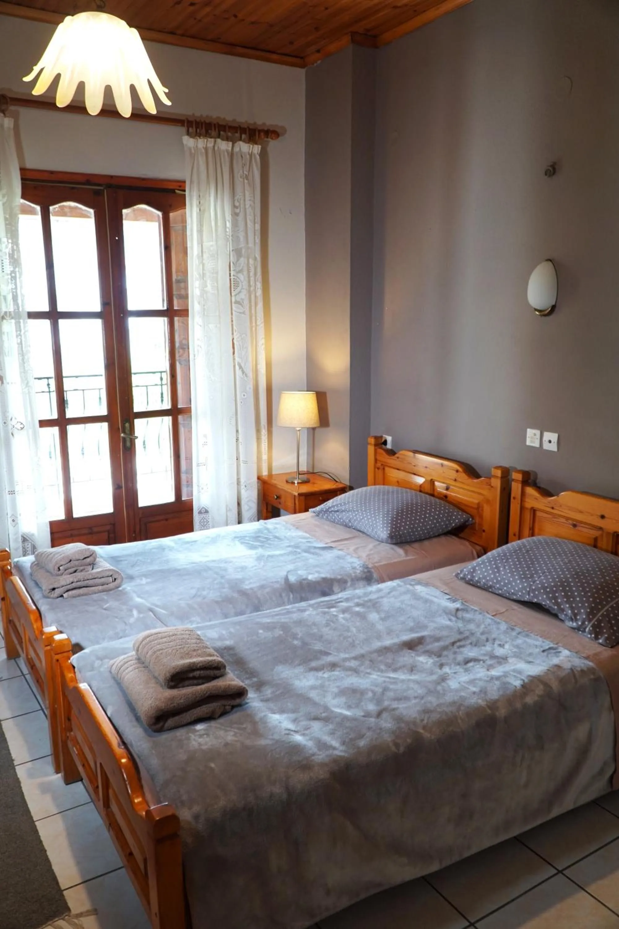 Bed in Hotel Defkalion