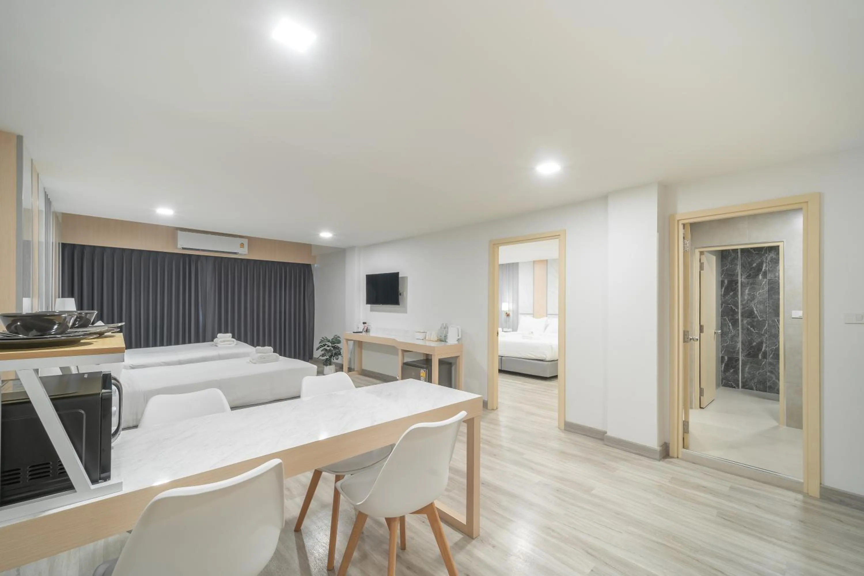 Living room, Bed in The Space Hotel Lampang