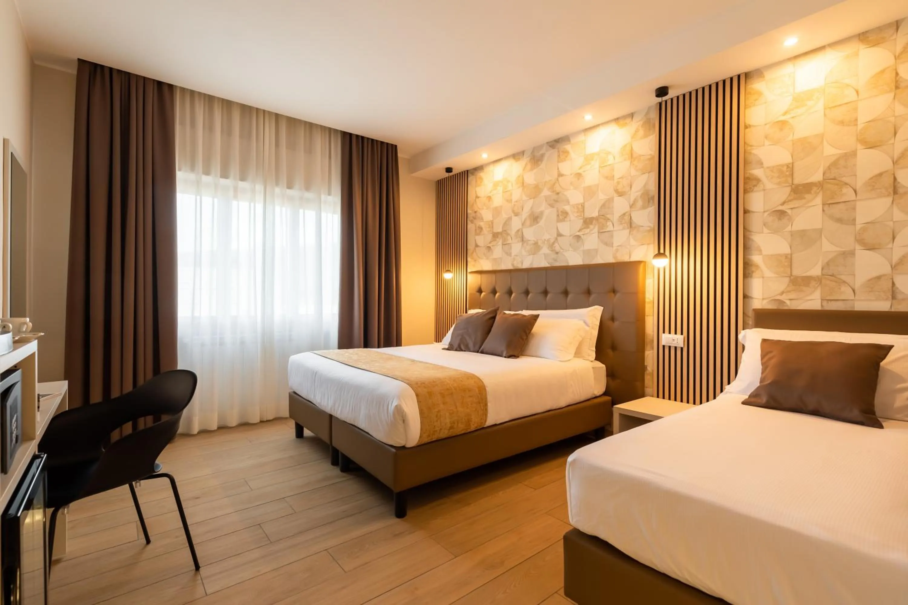 Bed in AlbaDea Suites&Jacuzzi