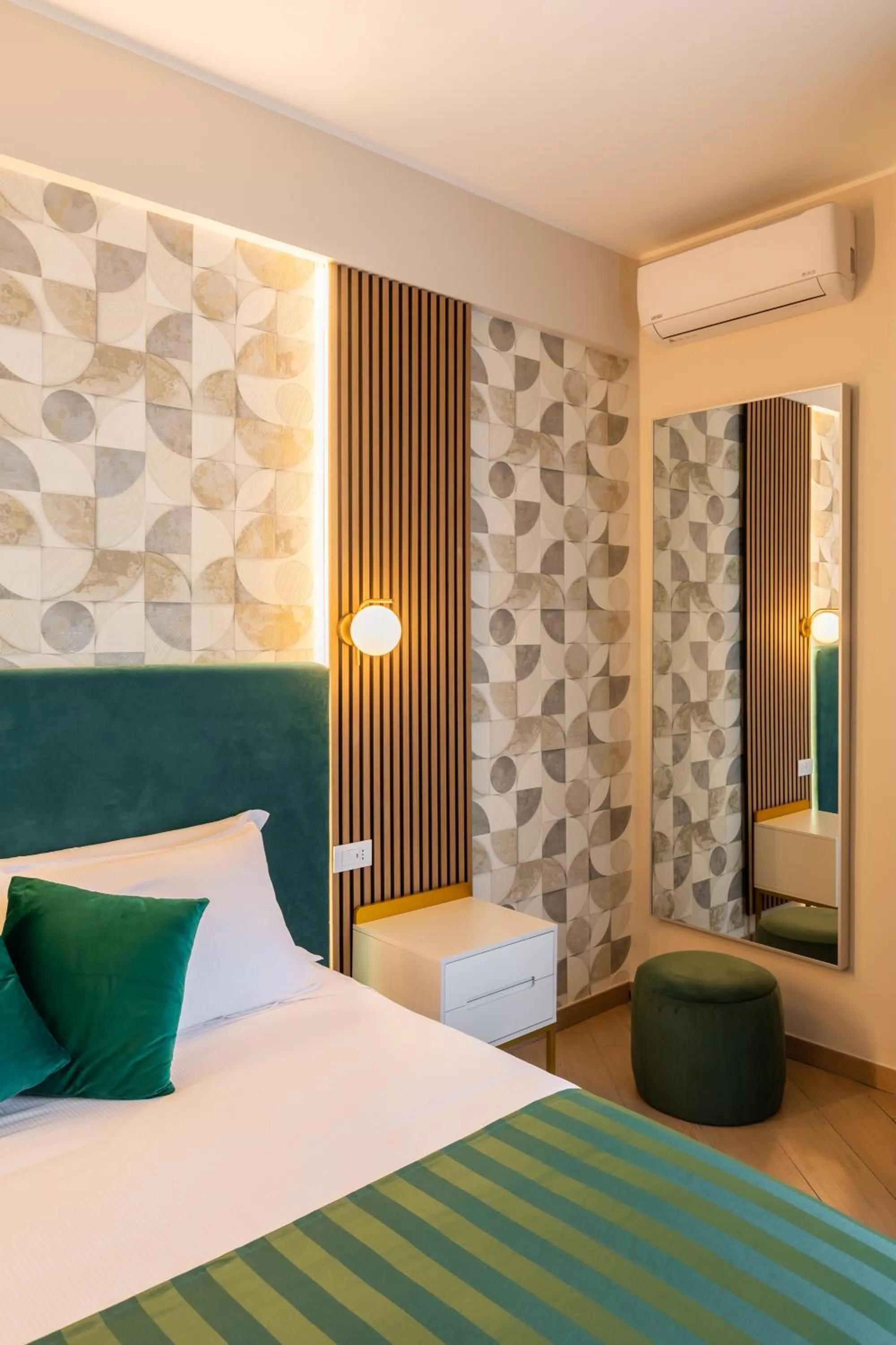 Bed in AlbaDea Suites&Jacuzzi