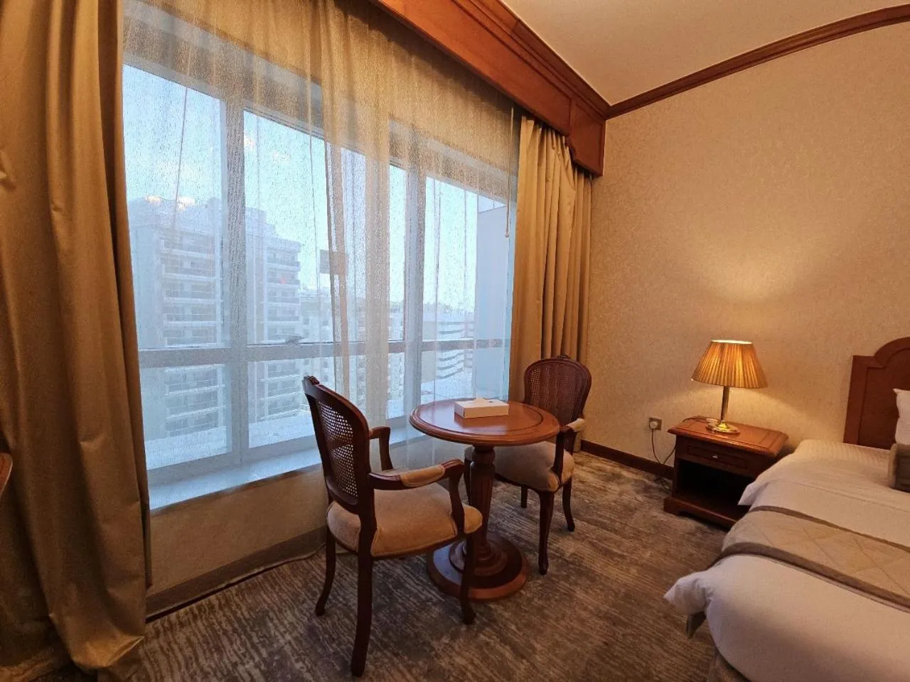 Bed in Royal Concorde Hotel & Suite