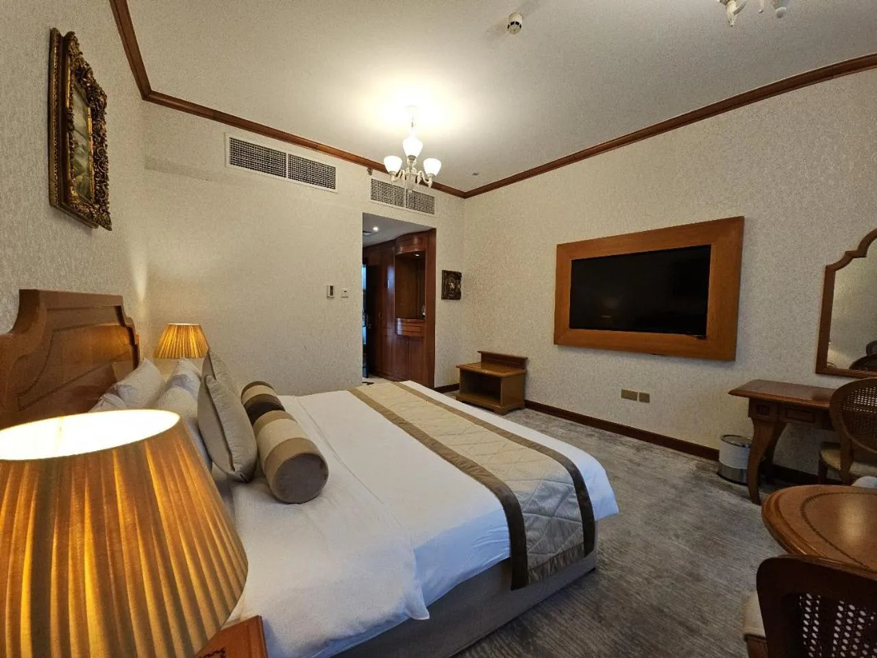 Bed in Royal Concorde Hotel & Suite