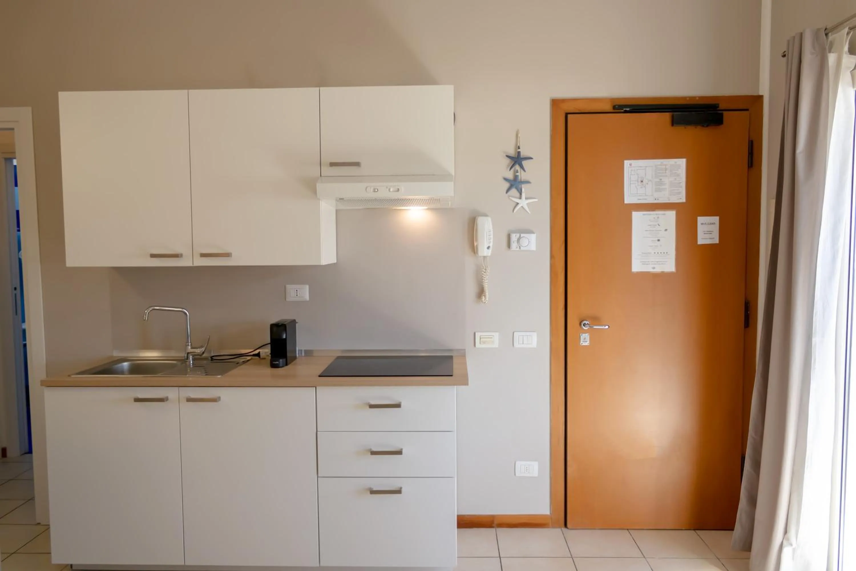 Kitchen or kitchenette in Residence Marittimo Riccione