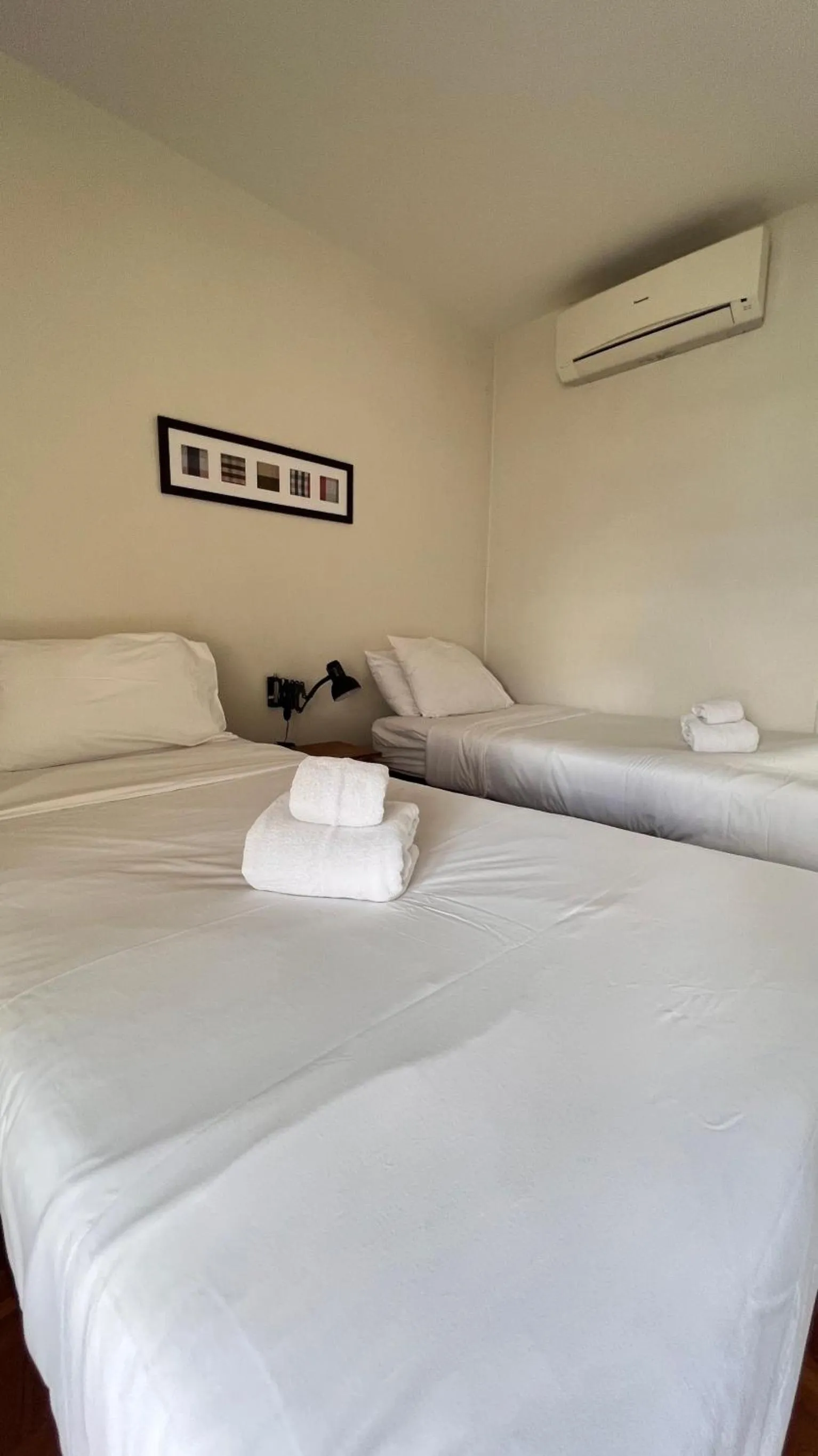 Bed in UDEE Cozy Hotel