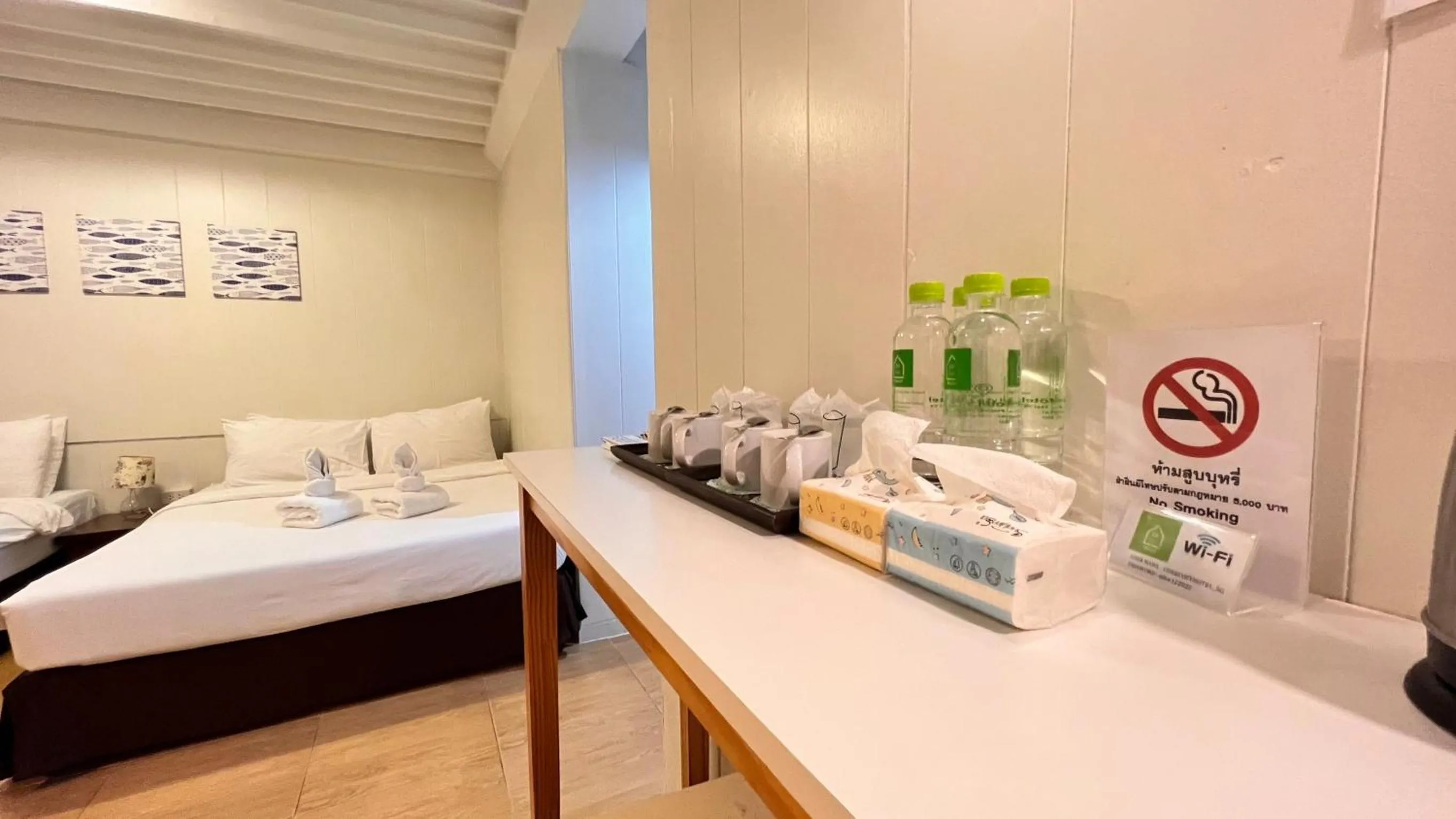 Bed in UDEE Cozy Hotel