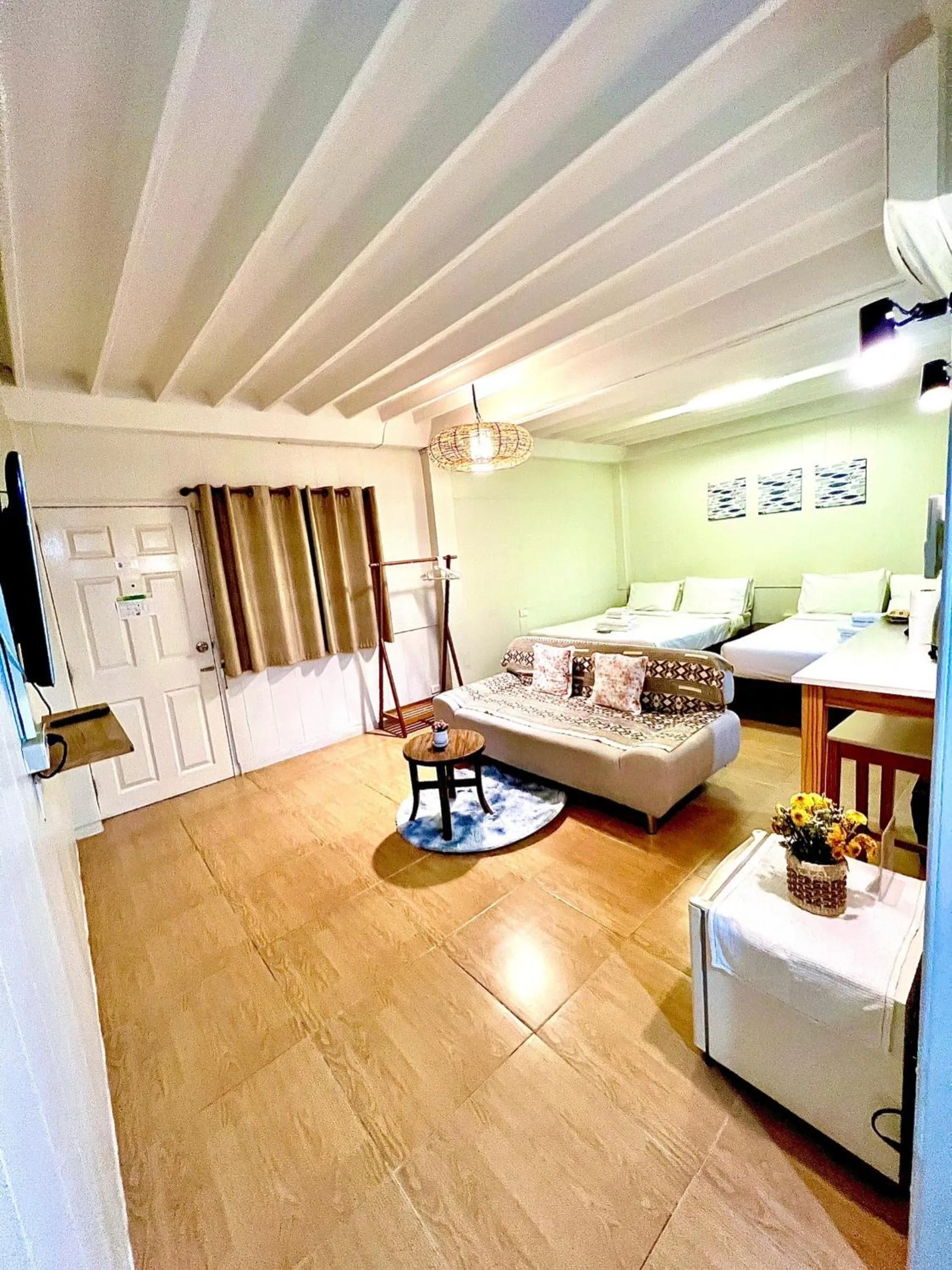 Bed in UDEE Cozy Hotel