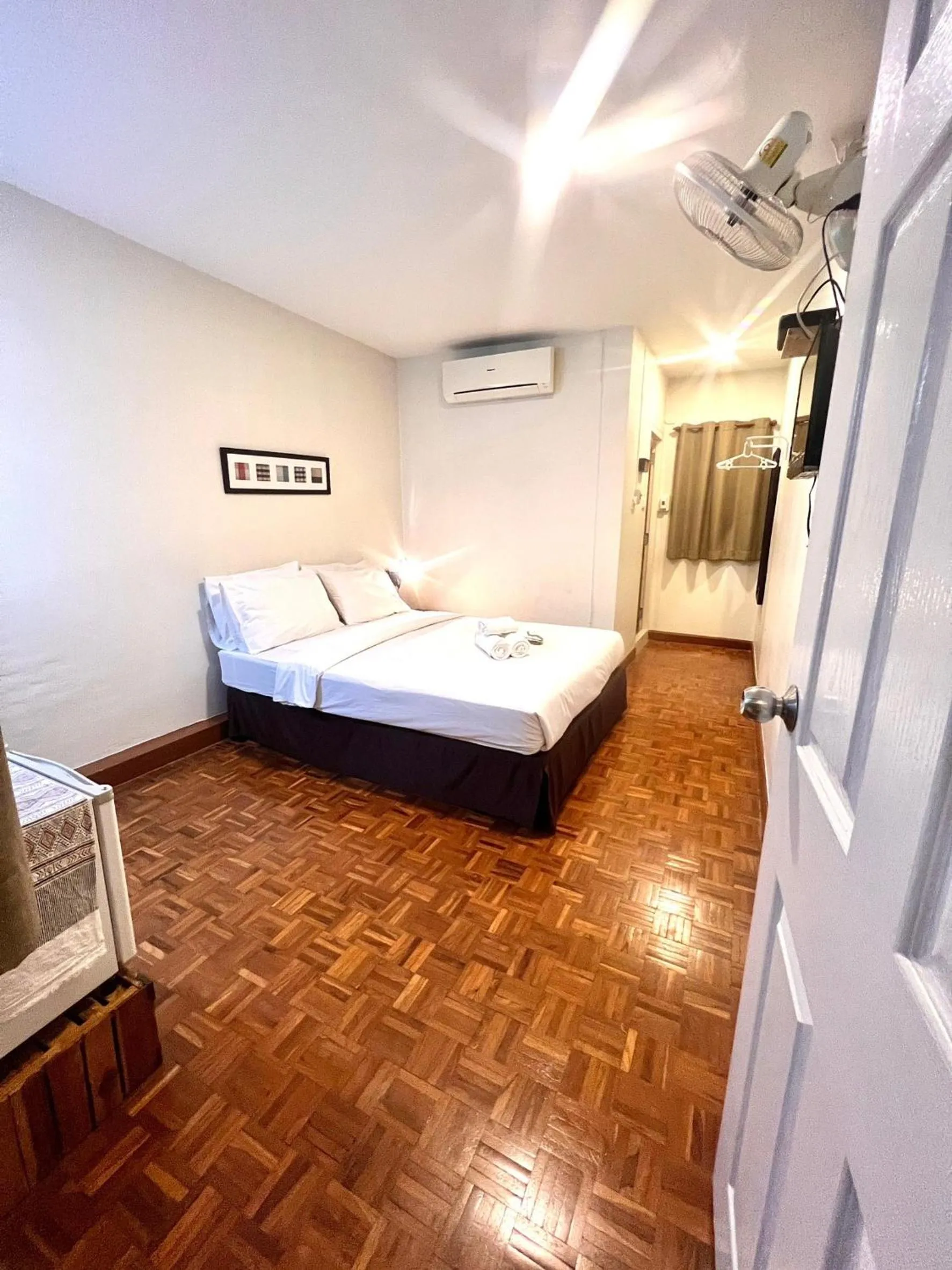 Bed in UDEE Cozy Hotel