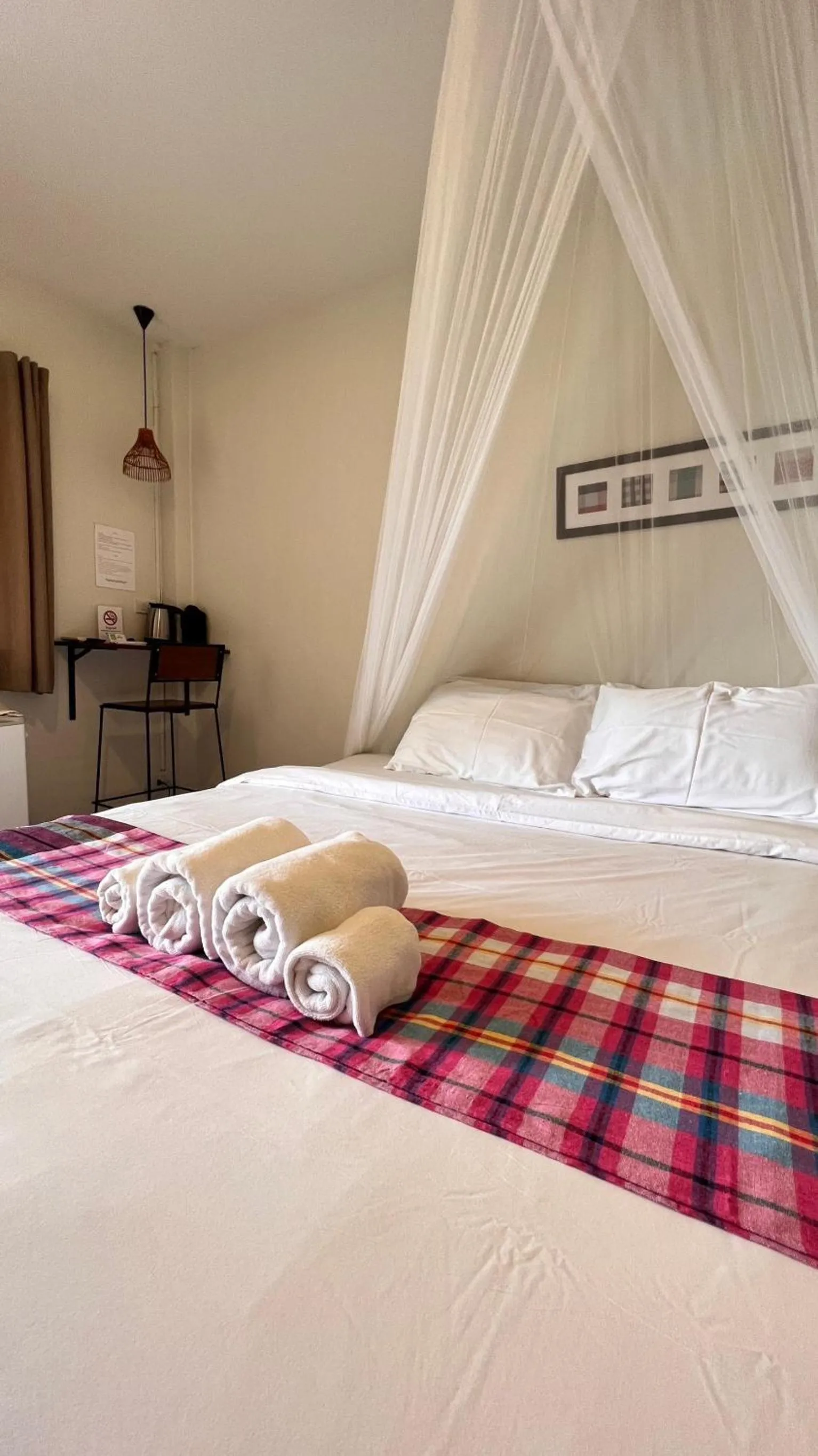 Bed in UDEE Cozy Hotel