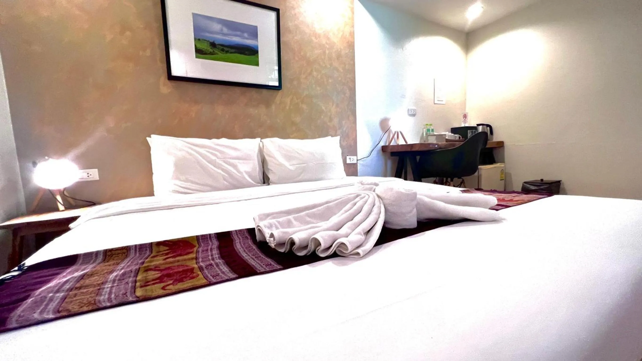 Bed in UDEE Cozy Hotel