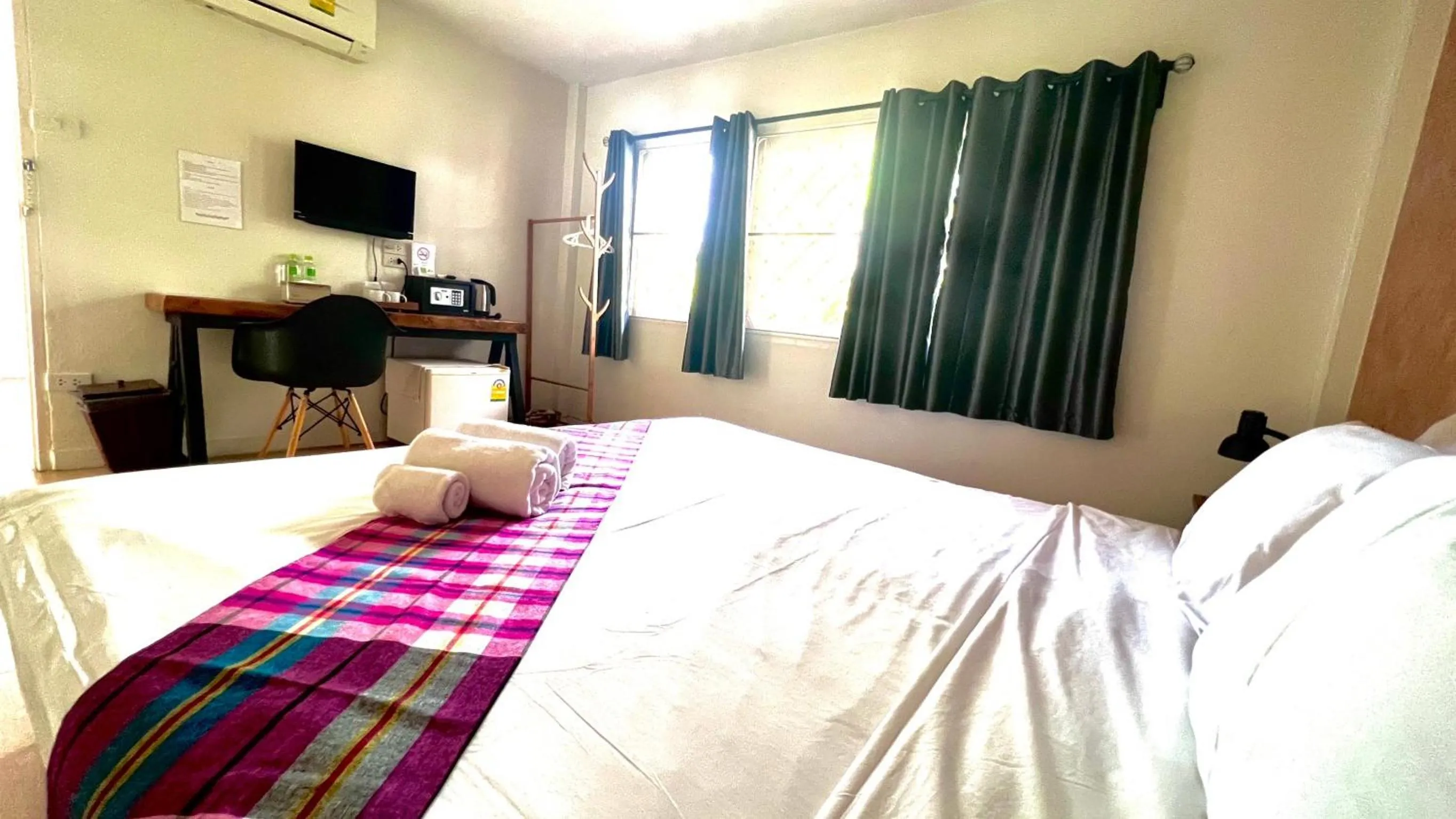 Bed in UDEE Cozy Hotel