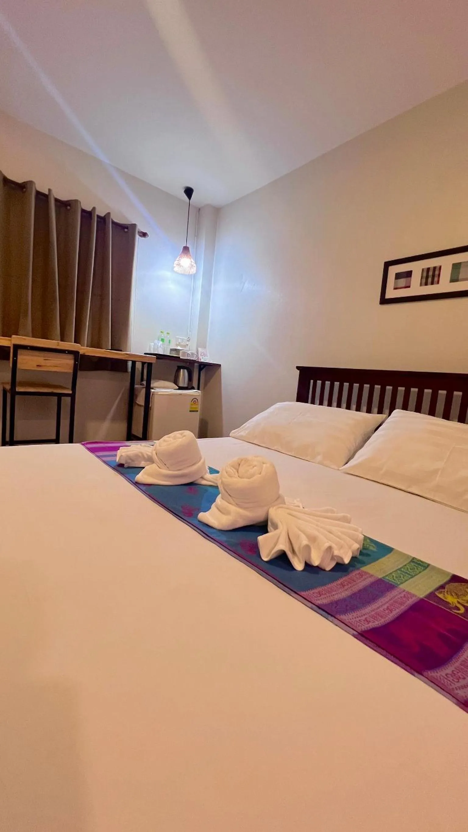 Bed in UDEE Cozy Hotel