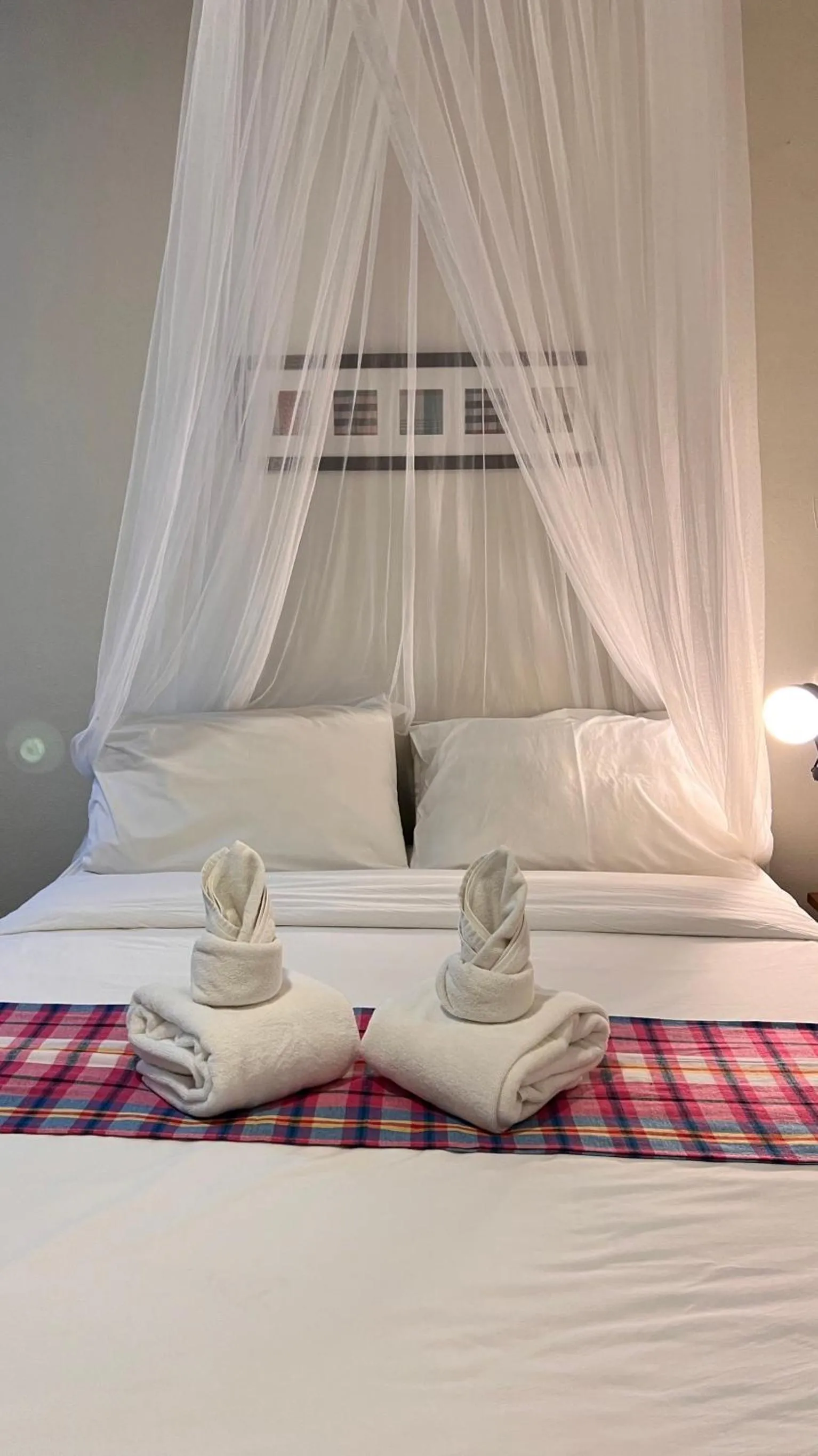 Bed in UDEE Cozy Hotel