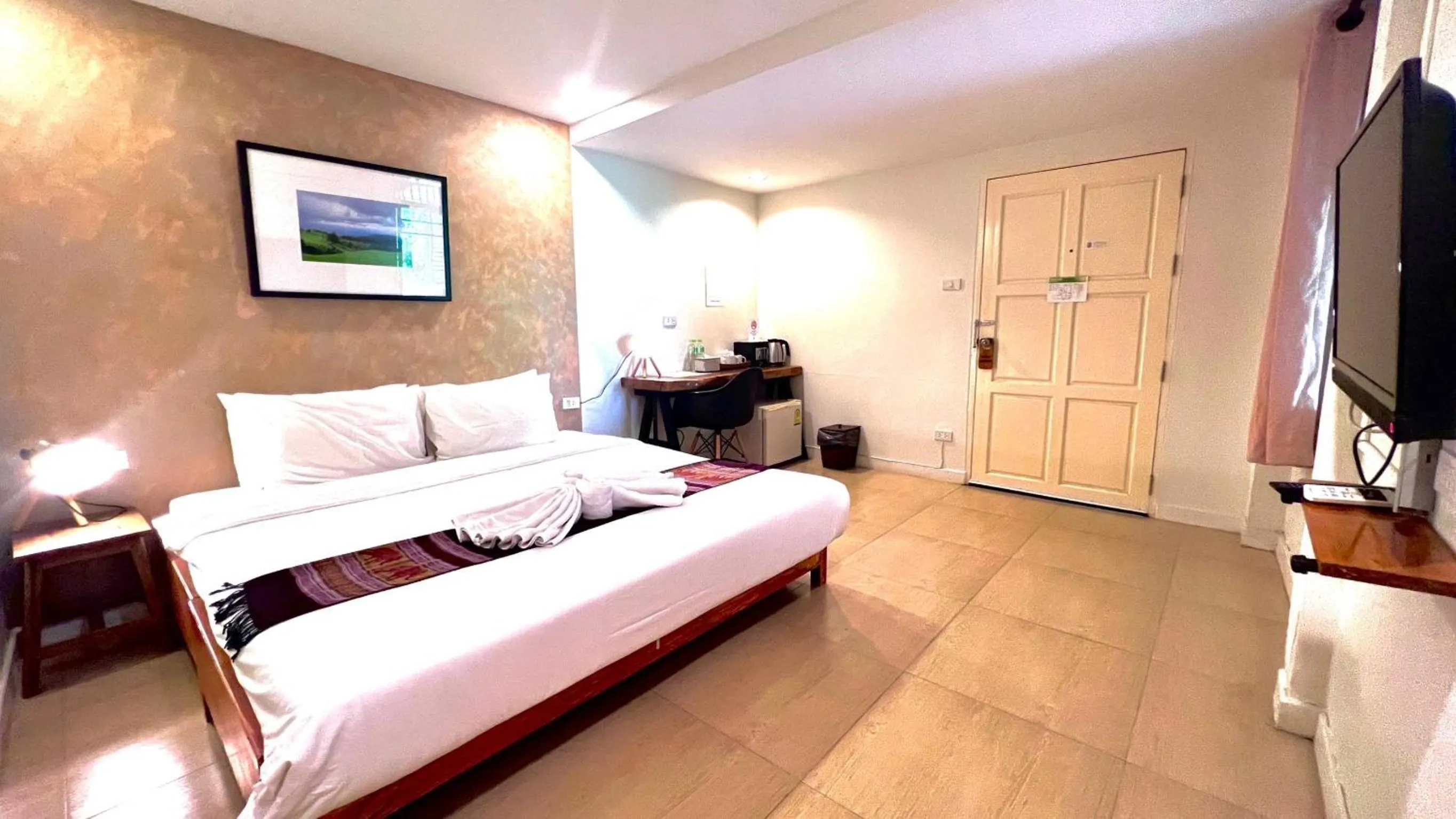 Bed in UDEE Cozy Hotel