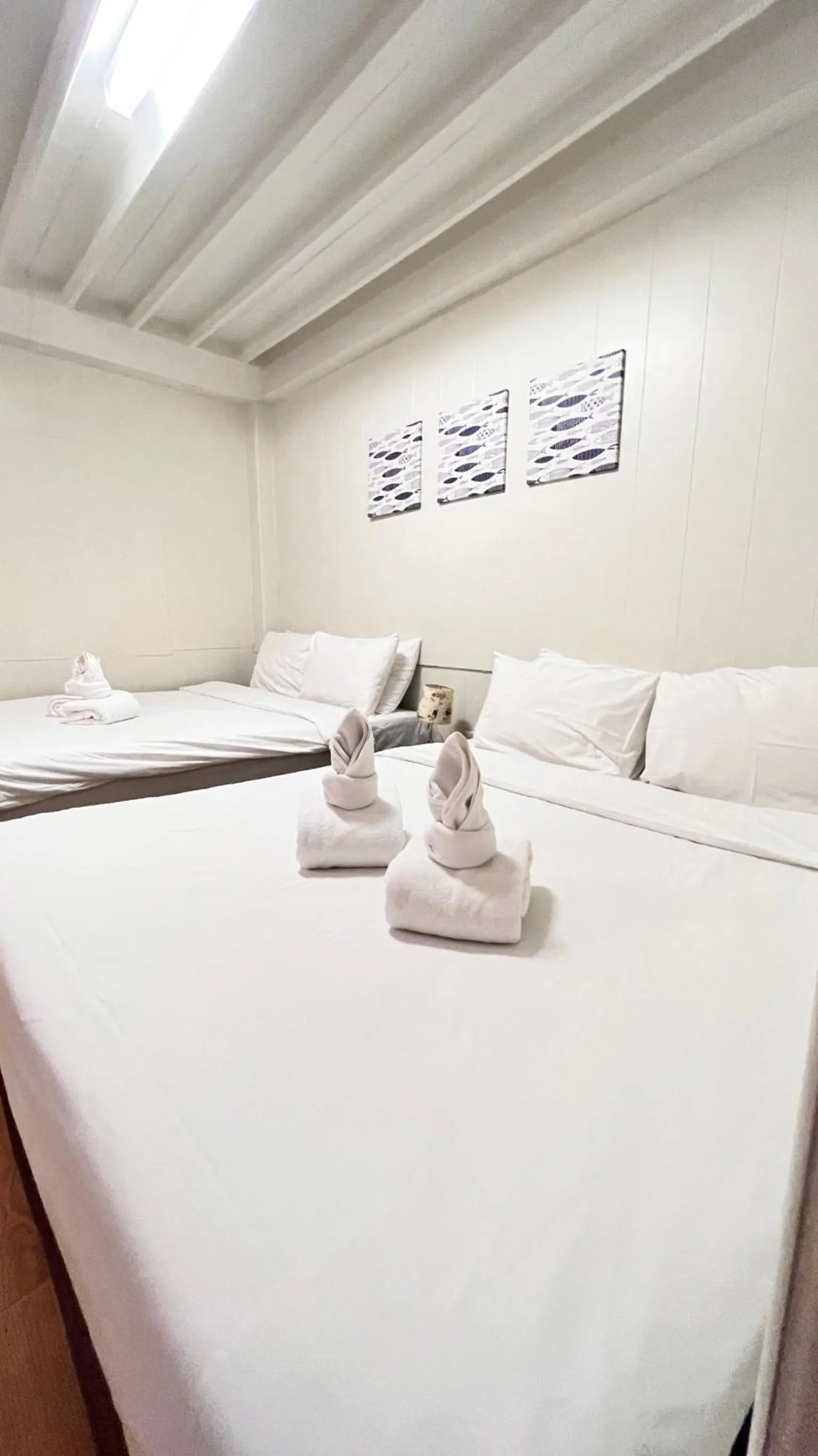 Bed in UDEE Cozy Hotel