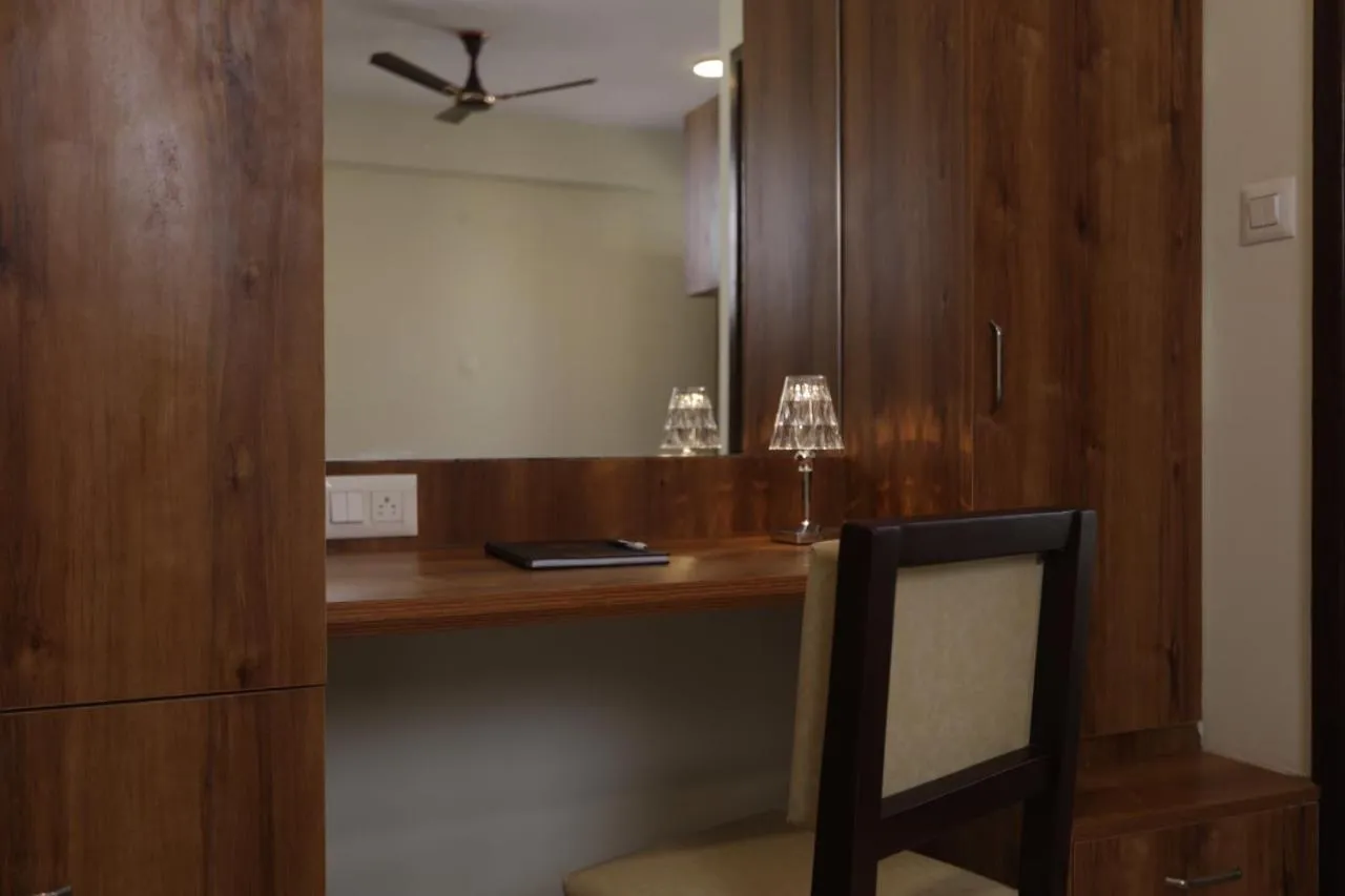 wardrobe in Elysian Grand Hotel