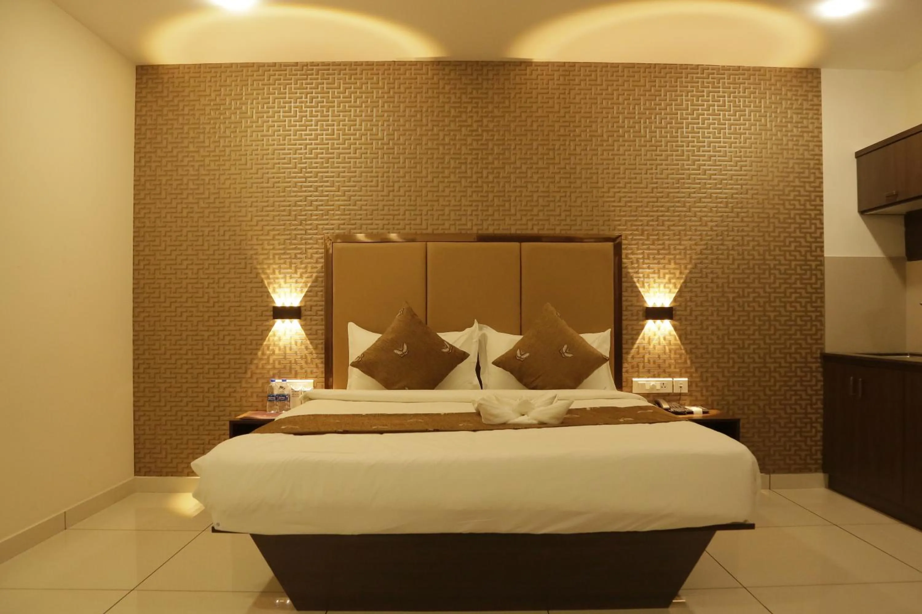 Bed in ESQUINA RESIDENCY