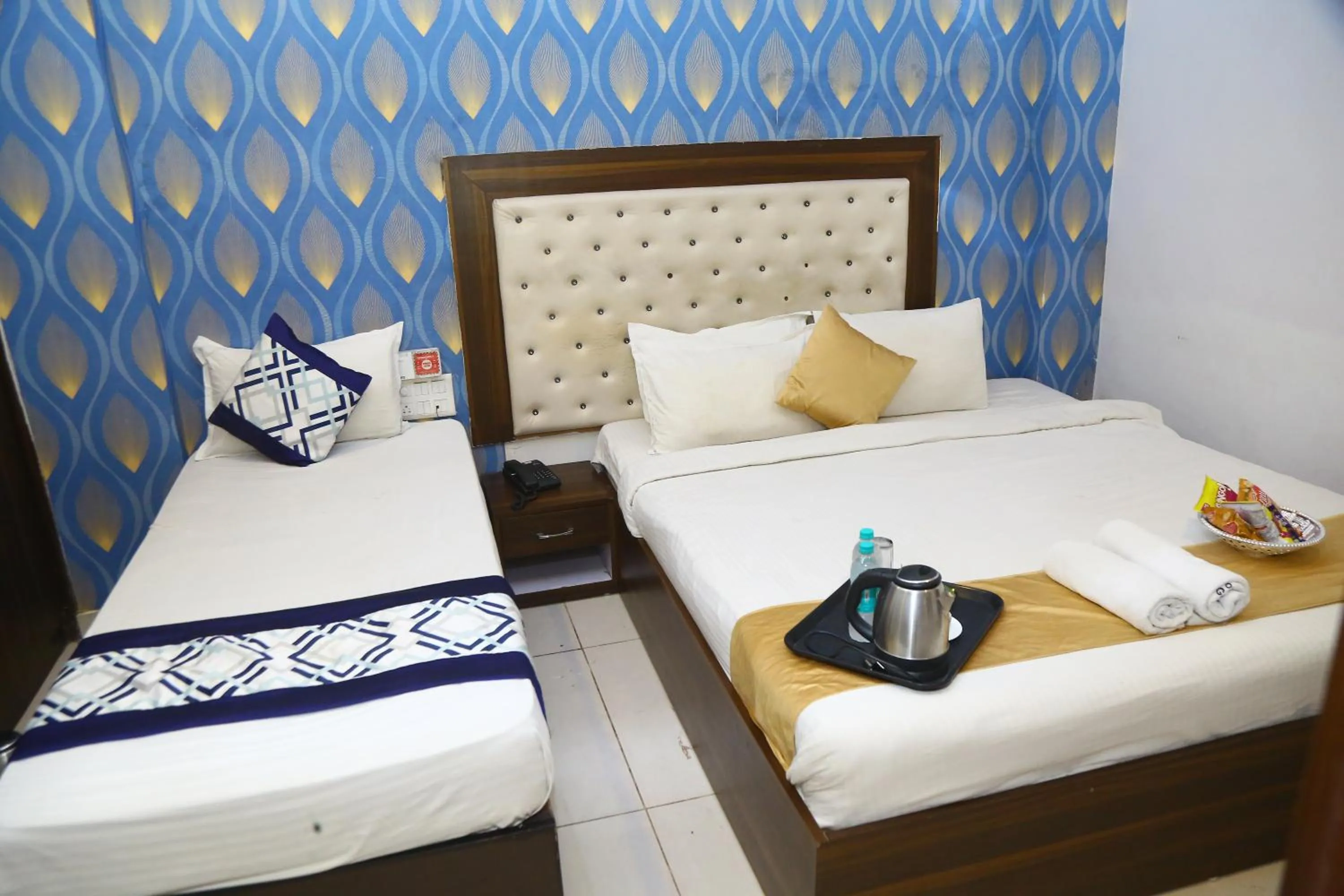 Bedroom, Bed in Hotel MN Grand Shamshabad Airport Zone Hyderabad