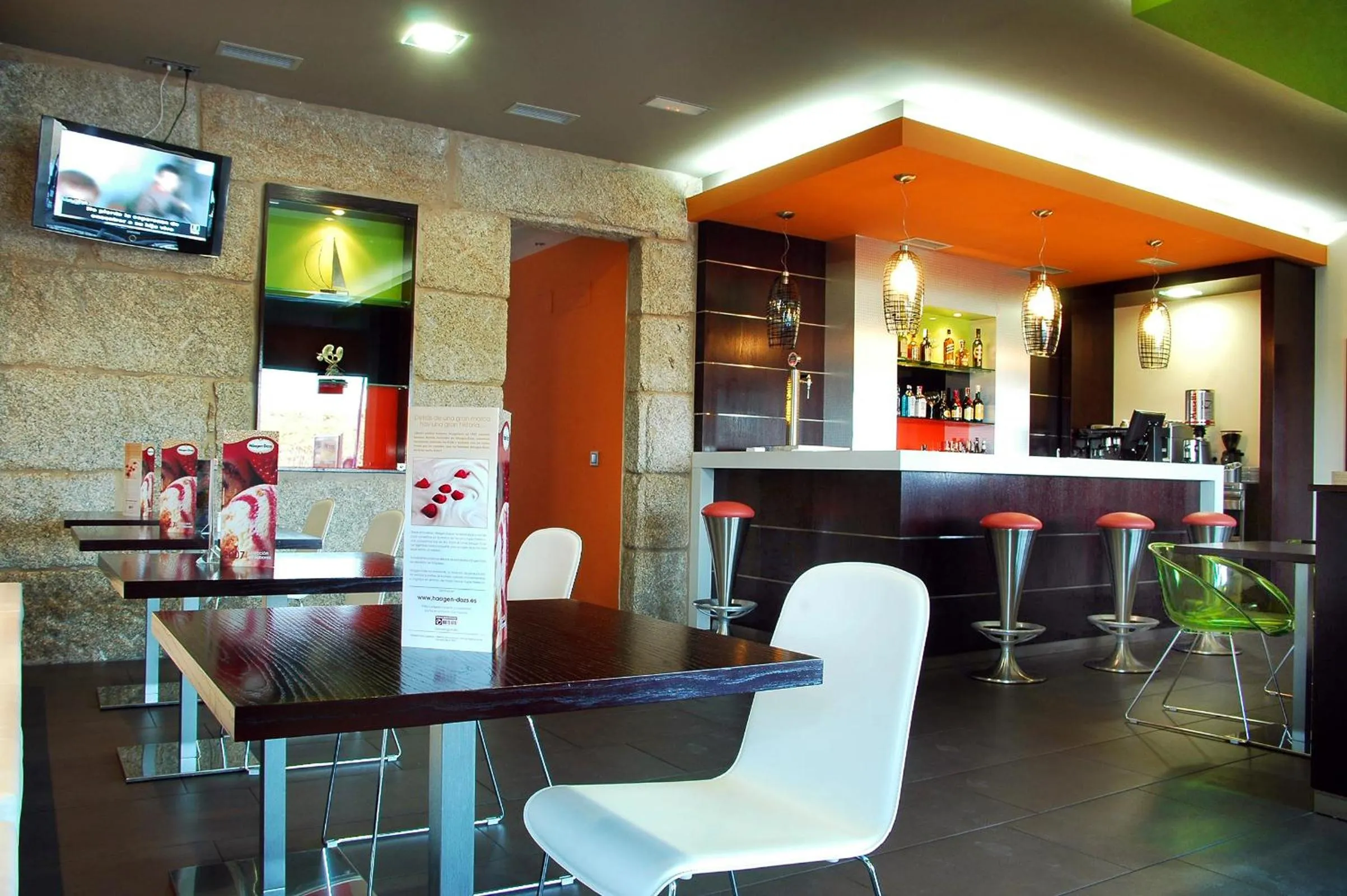 Communal lounge/ TV room in Hotel Puente de La Toja