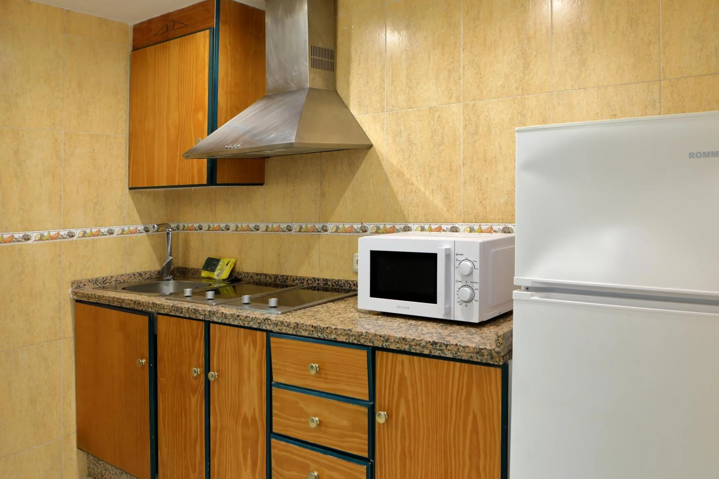 Kitchen or kitchenette in Hotel Apartamentos Pyr Fuengirola