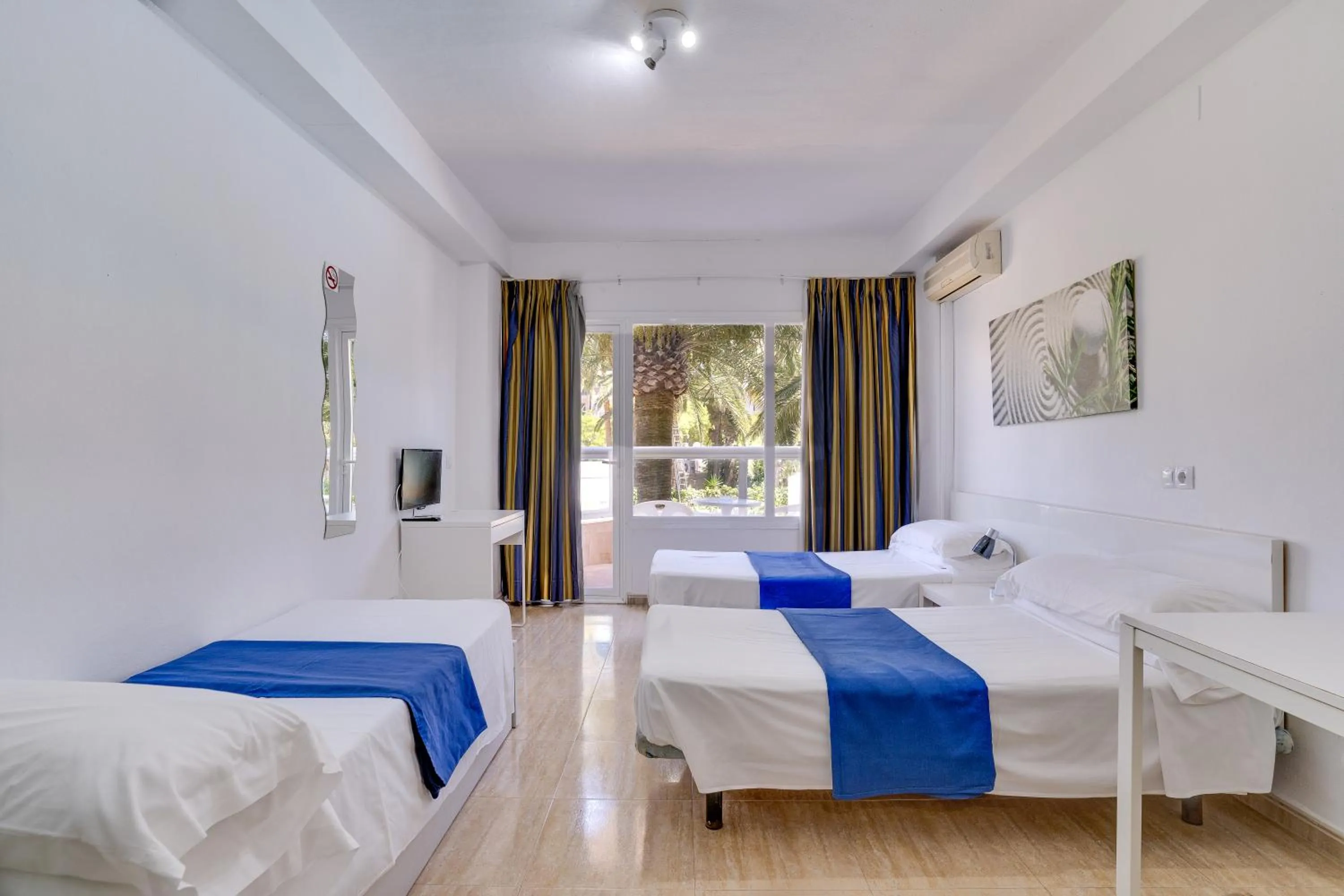 Bedroom, Bed in Las Palomas Apartments Econotels