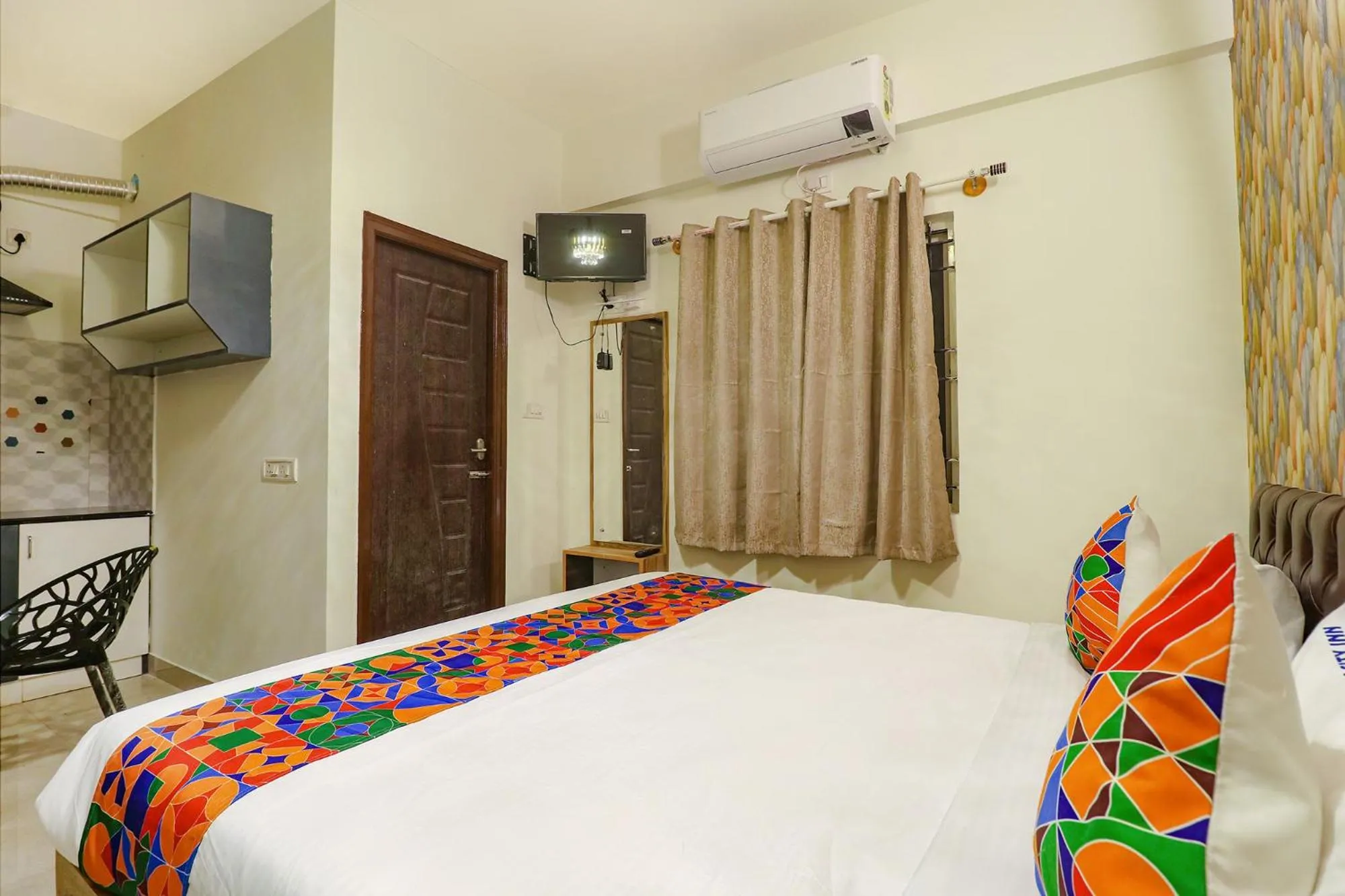 Photo of the whole room, Bed in FabHotel E City Inn - 3km from Infosys Campus