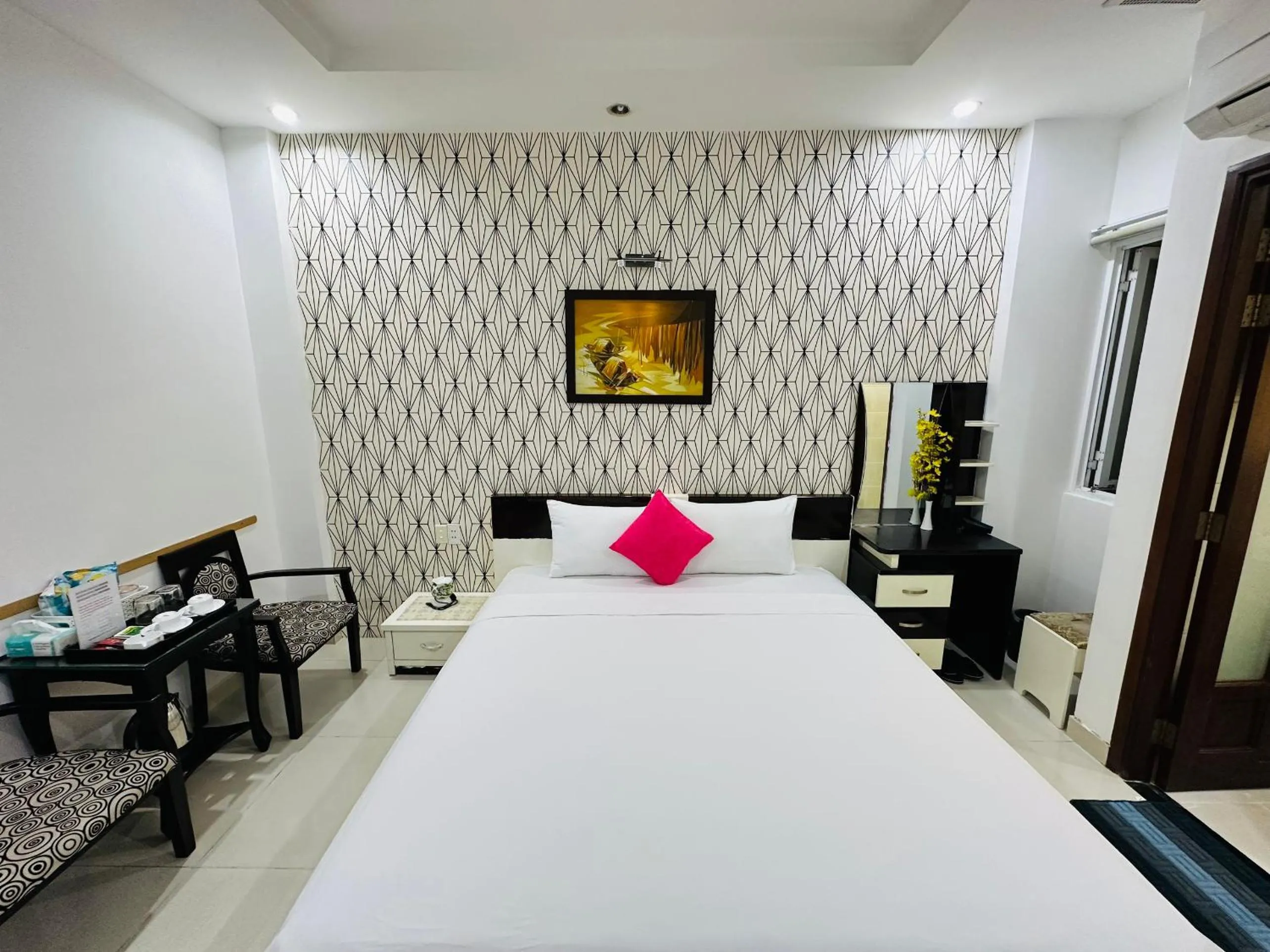 Bed in REDFLOWER HOTEL