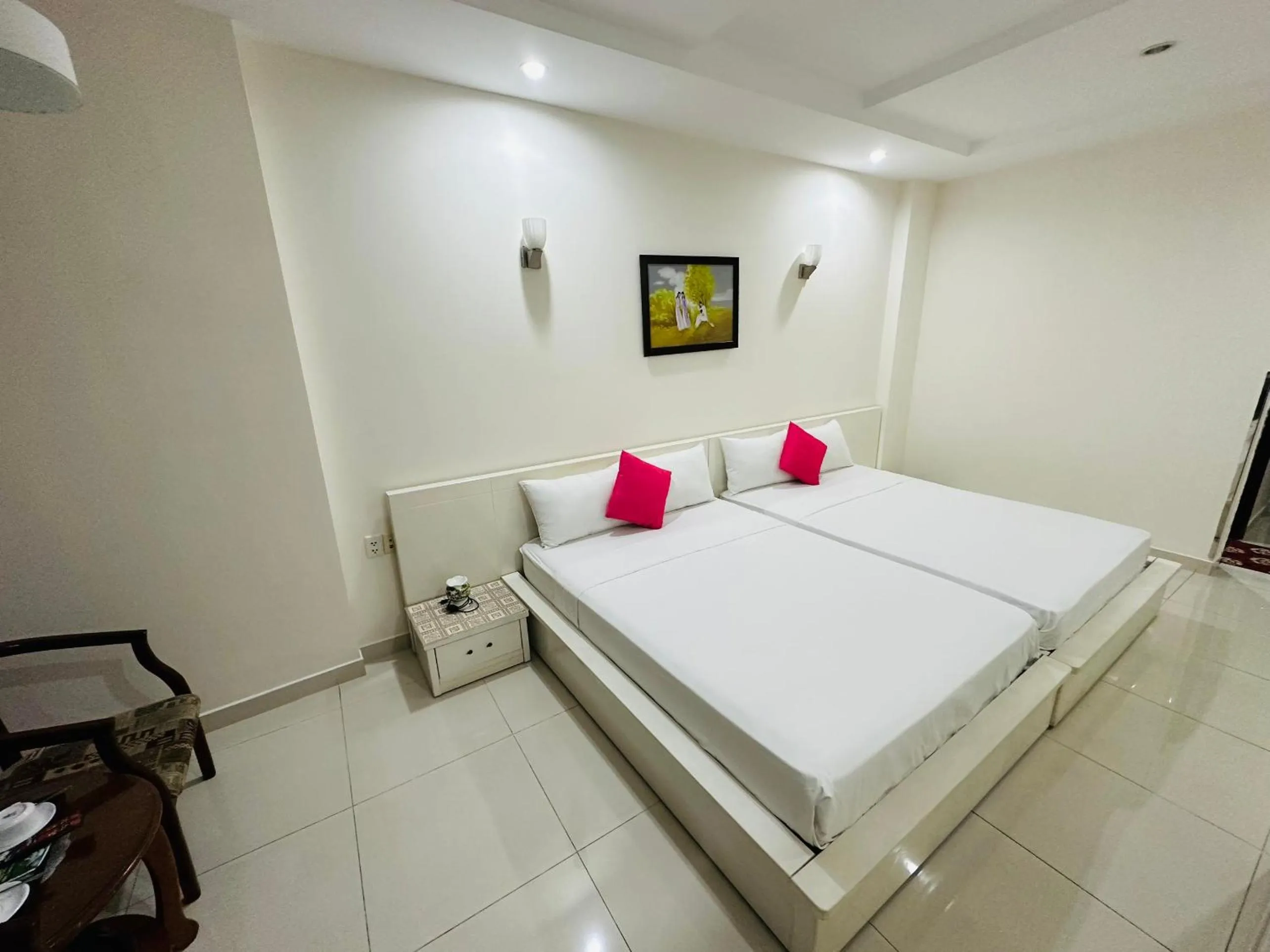 Bed in REDFLOWER HOTEL