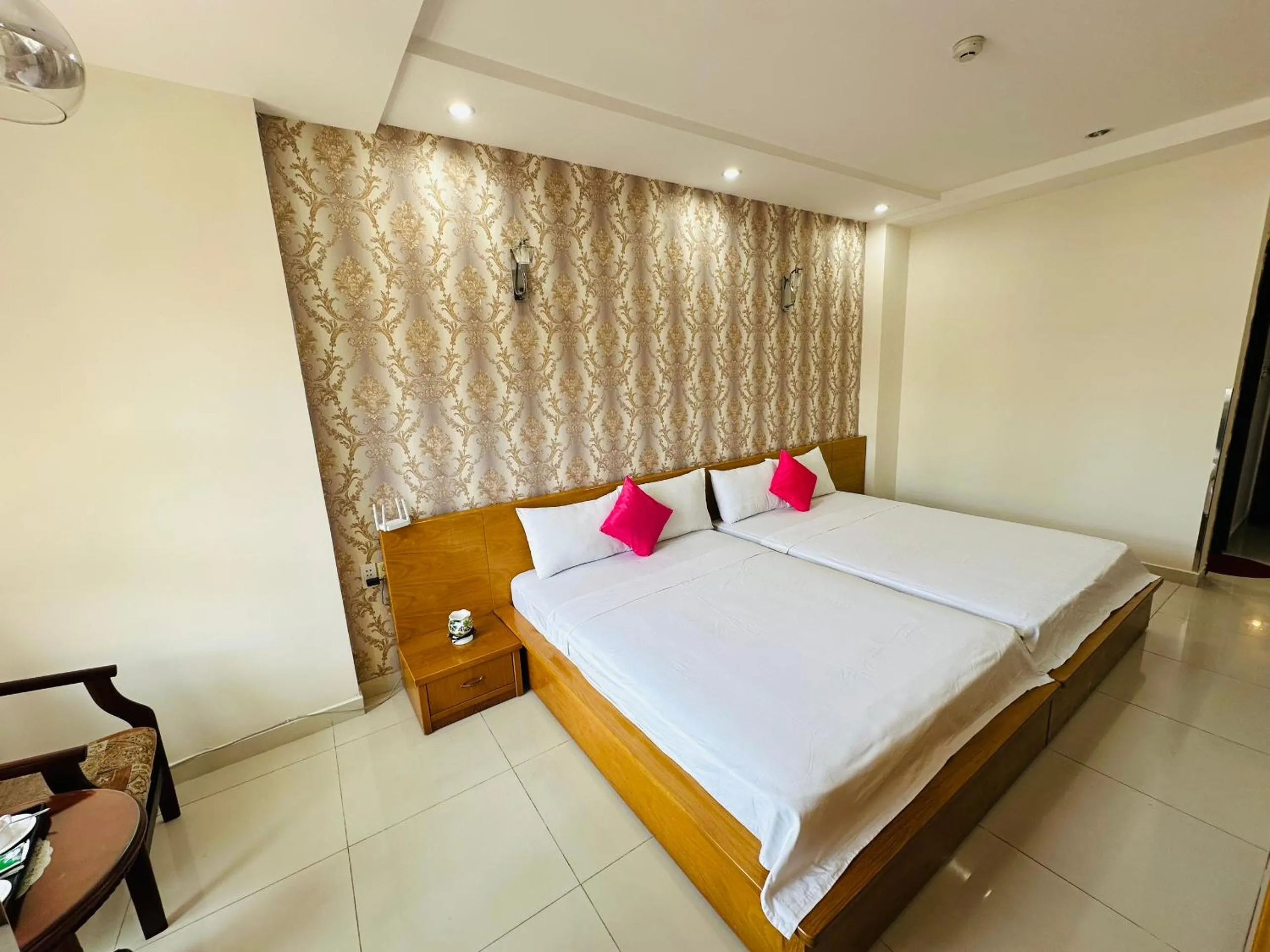 Bed in REDFLOWER HOTEL