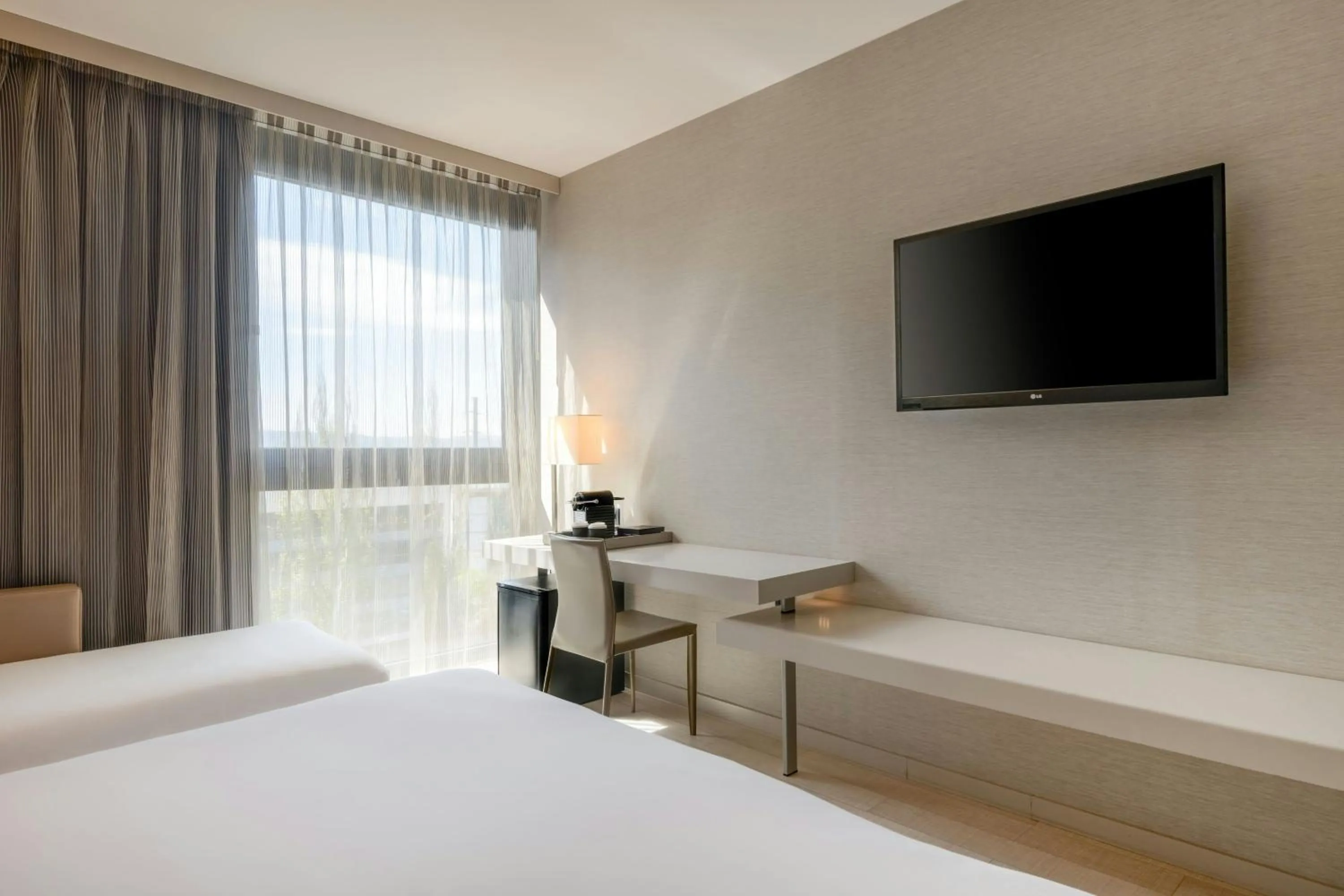 Photo of the whole room, Bed in AC Hotel San Cugat by Marriott