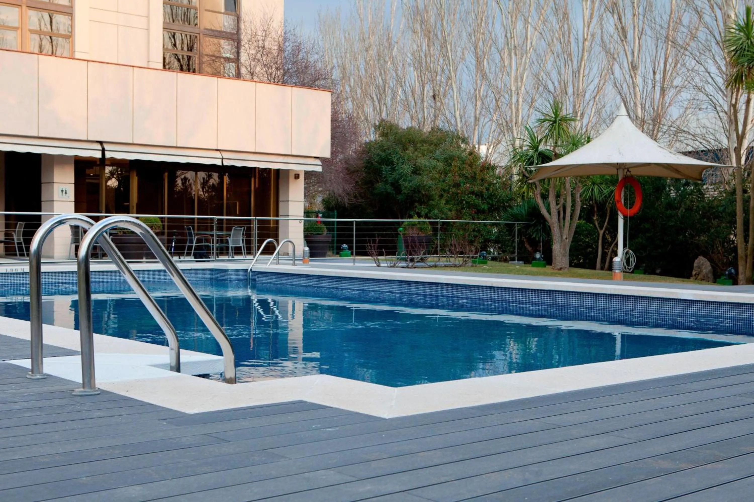 Swimming pool in AC Hotel San Cugat by Marriott