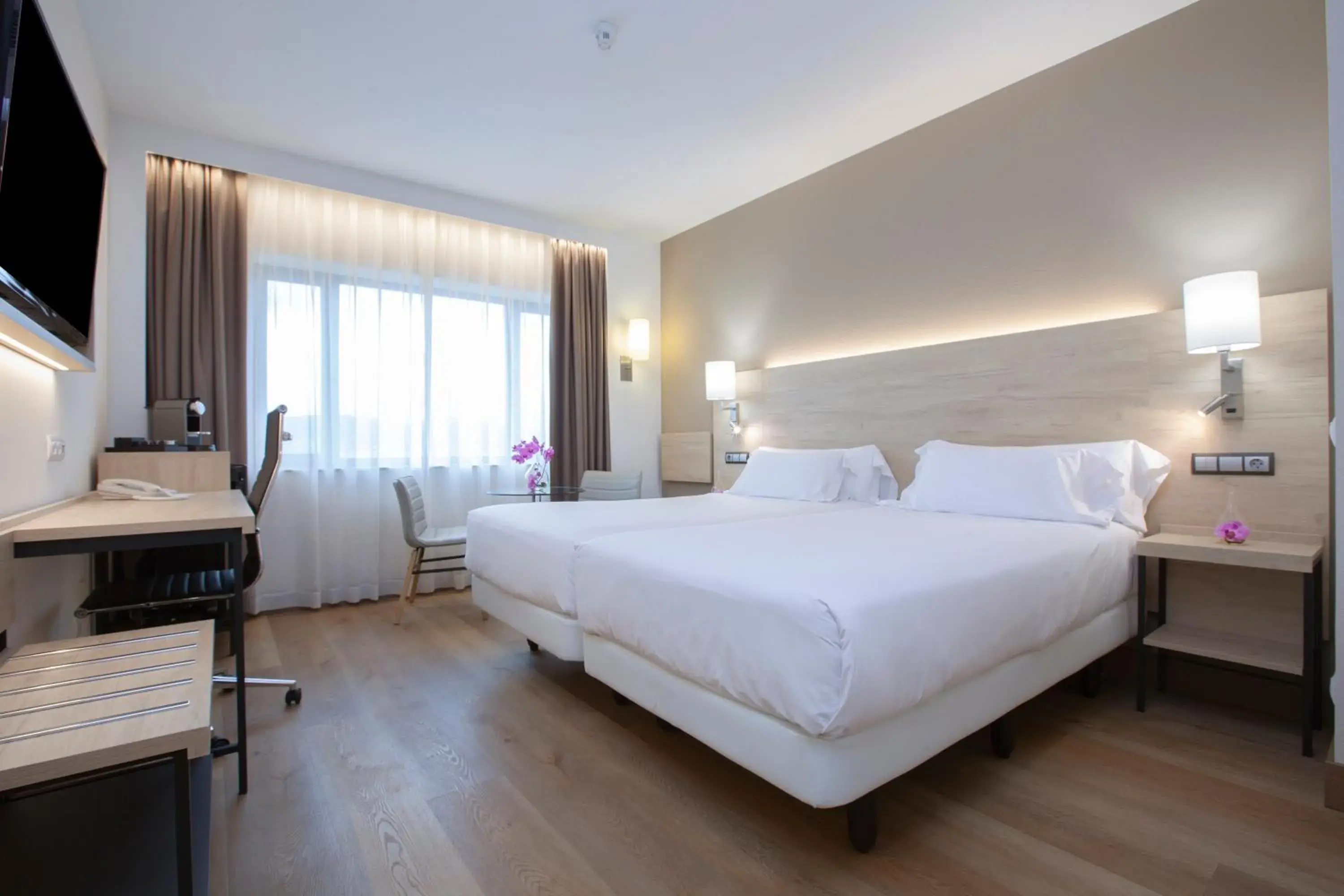 Junior Suite Family Room in Hotel Puerta de Bilbao Junior Suite Family Room in Hotel Puerta de Bilbao