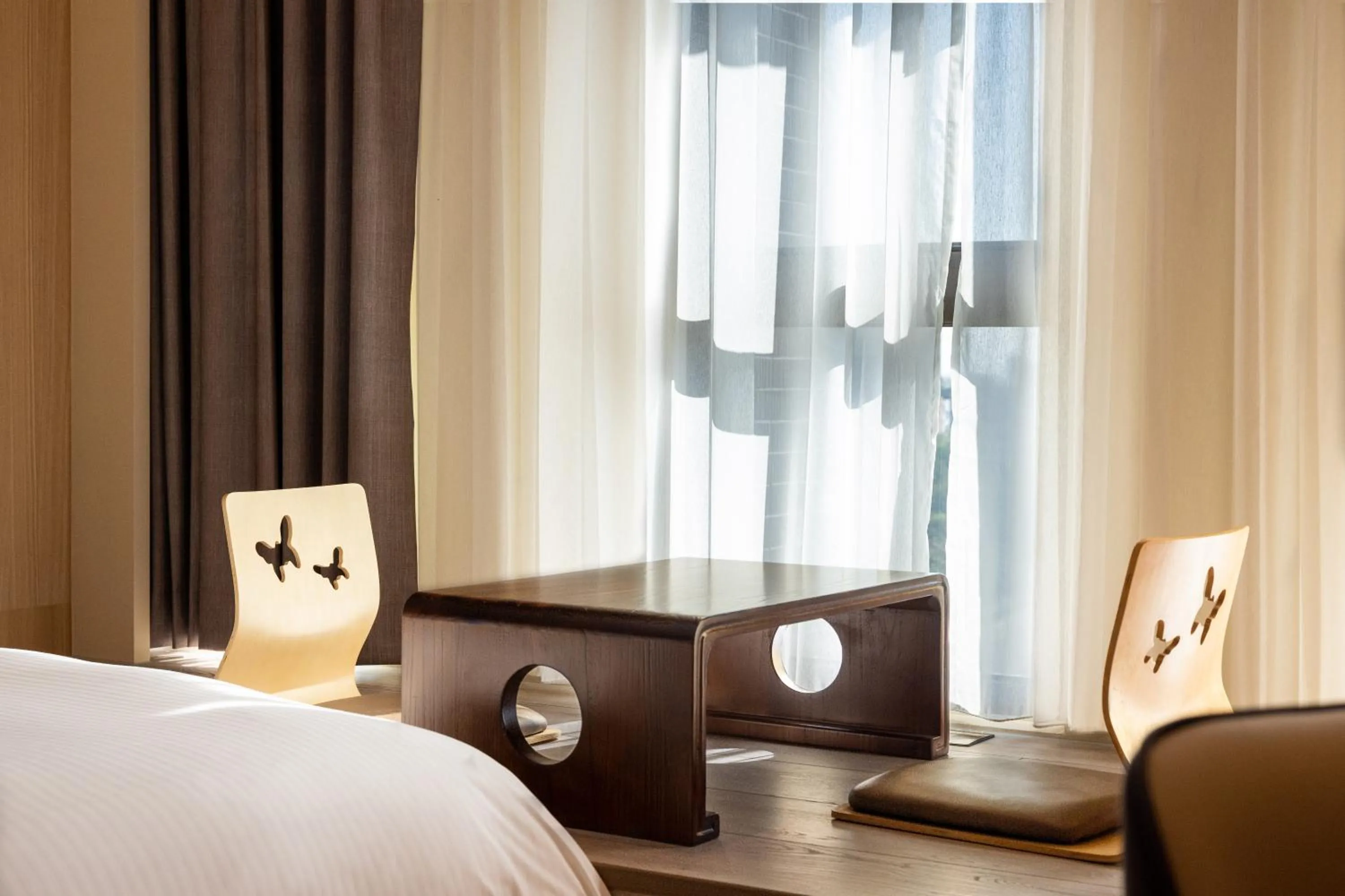 Photo of the whole room, Bed in Euphoria Hotel Lukang