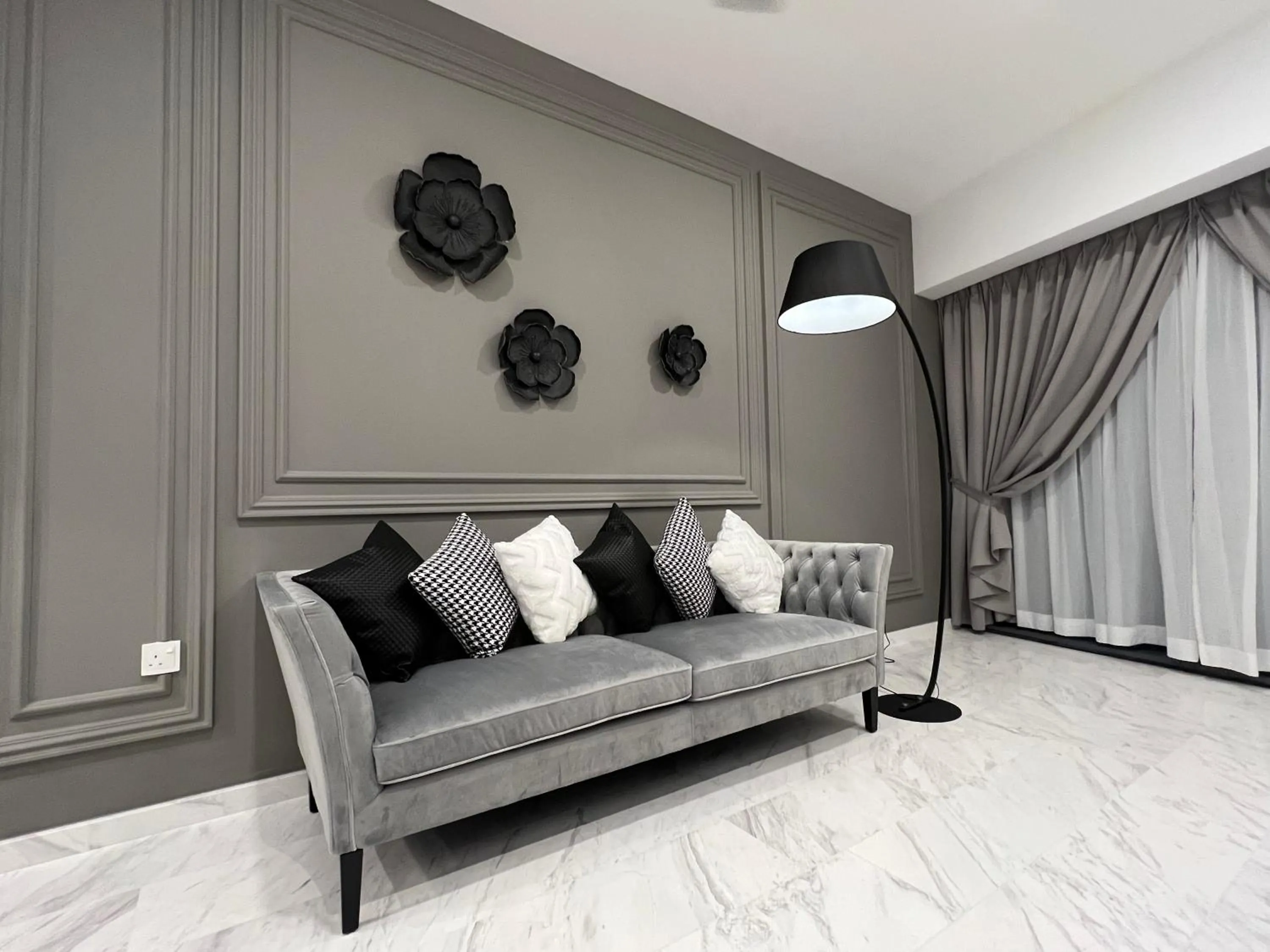 Living room in Eaton Residences KLCC by WSD