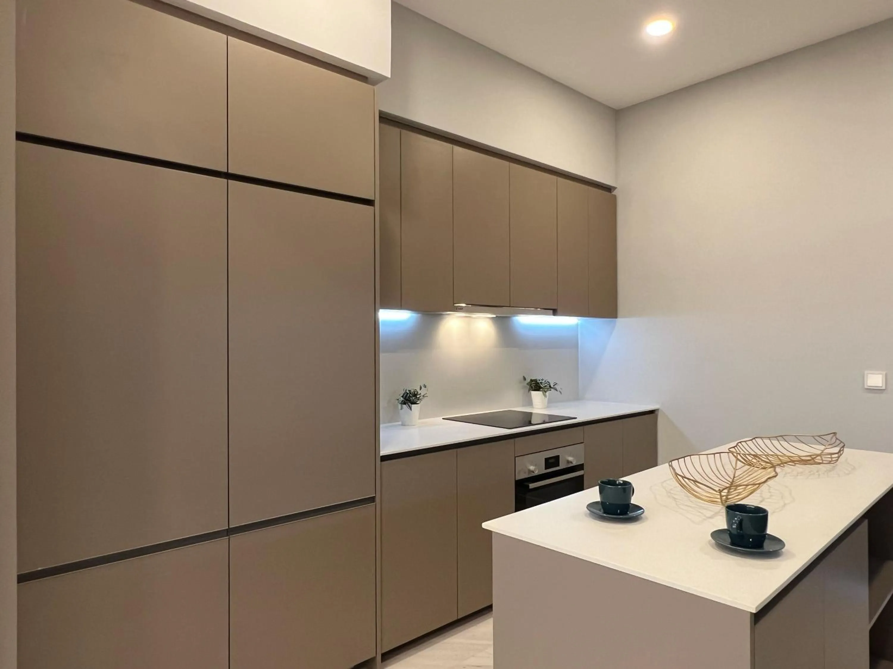 Kitchen or kitchenette in Eaton Residences KLCC by WSD