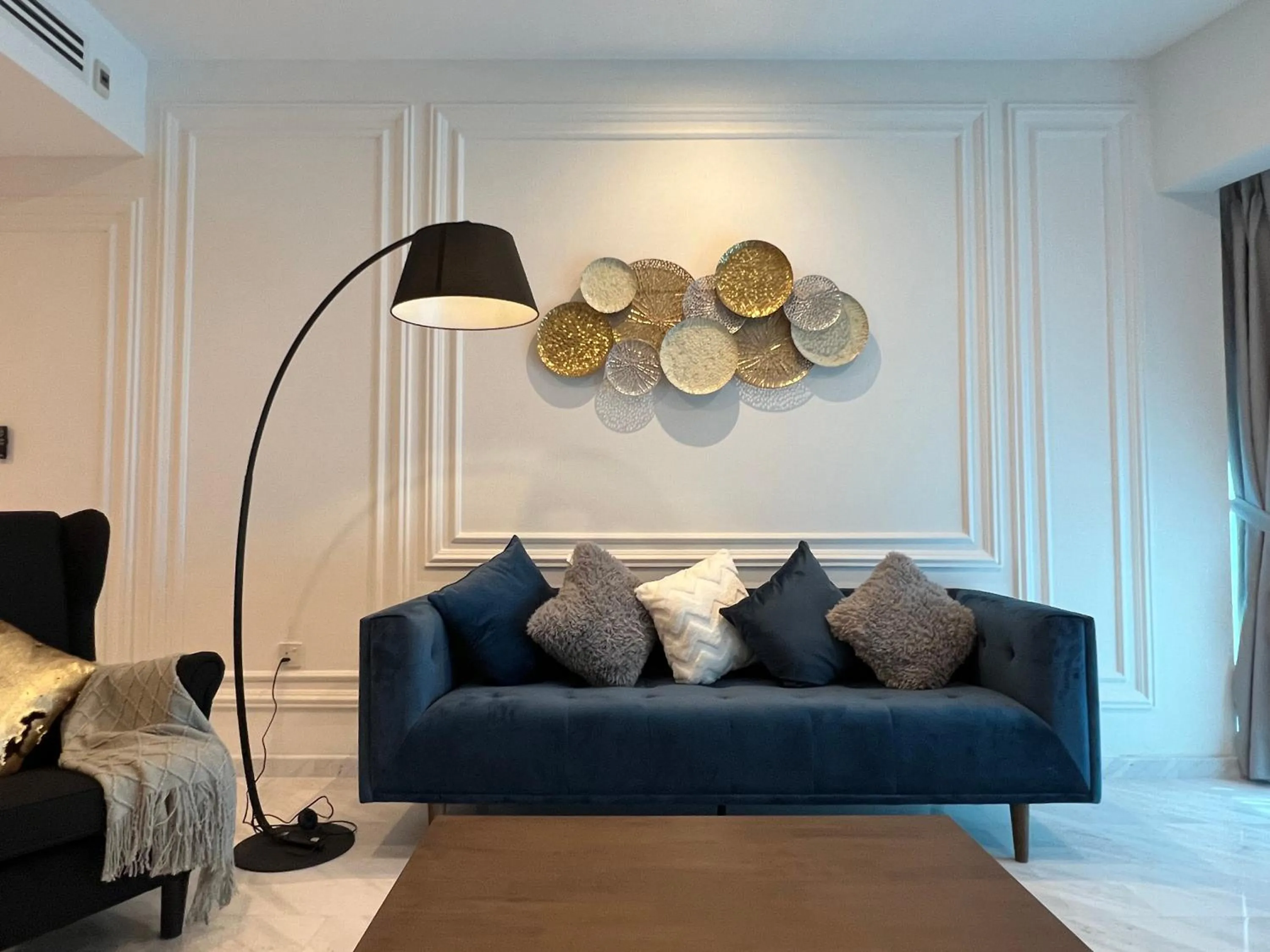 Living room in Eaton Residences KLCC by WSD