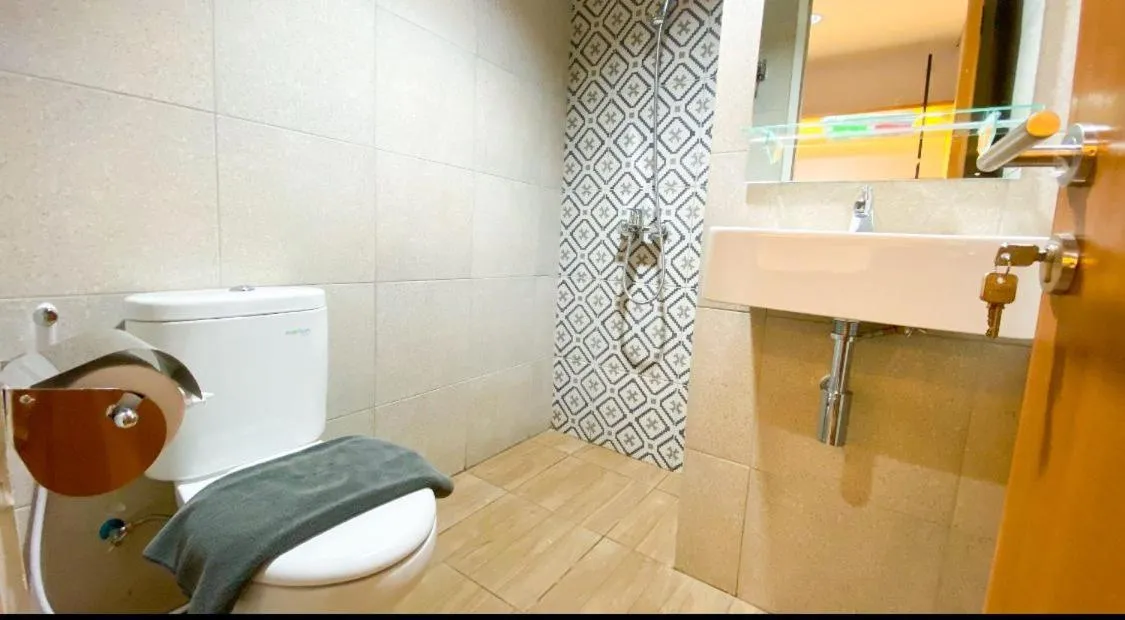 Shower in Menara One Hotel by Menara Santosa