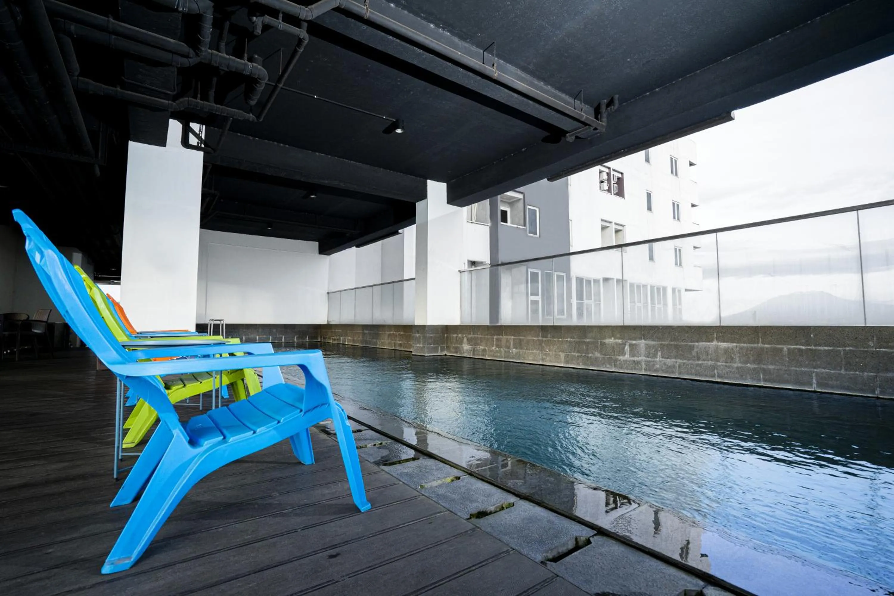 Swimming pool in Menara One Hotel by Menara Santosa