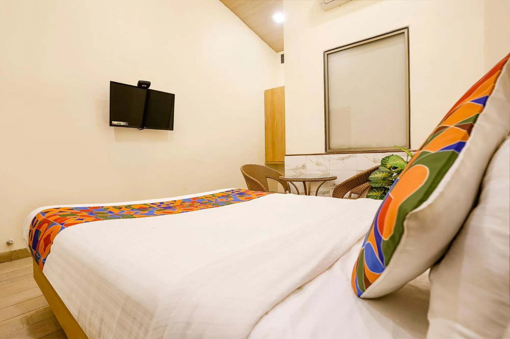Bed in FabHotel Malali Residency