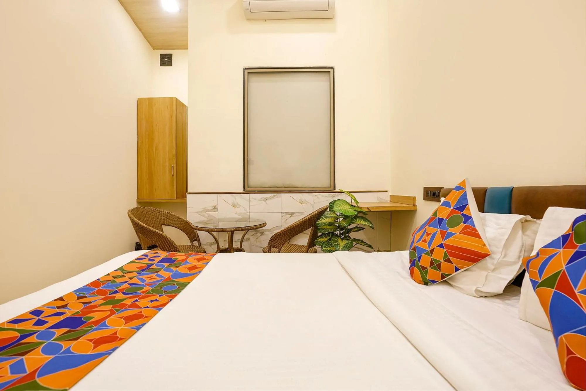 Bed in FabHotel Malali Residency