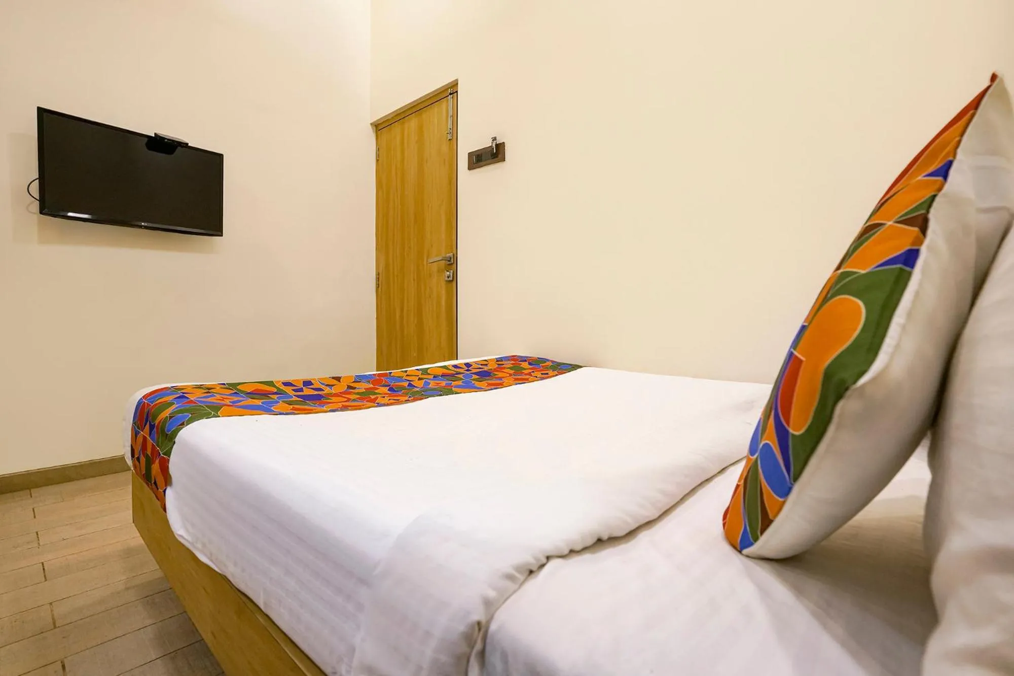 Bed in FabHotel Malali Residency