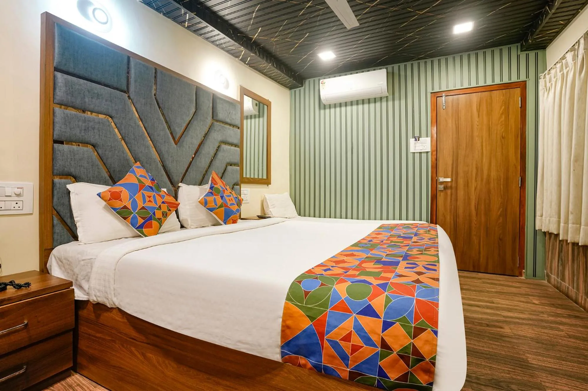 Bed in FabHotel Malali Residency