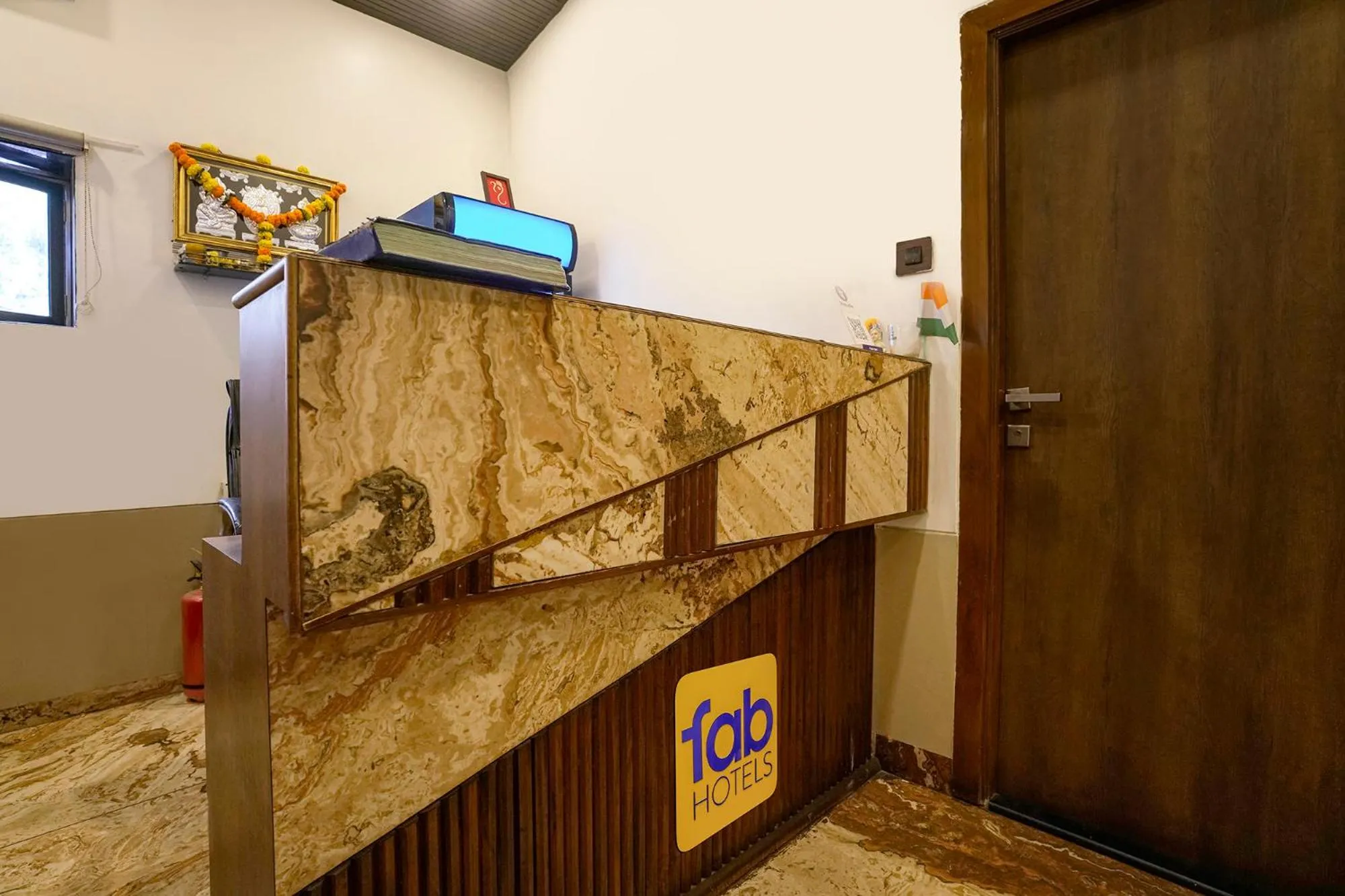 Lobby or reception in FabHotel Malali Residency